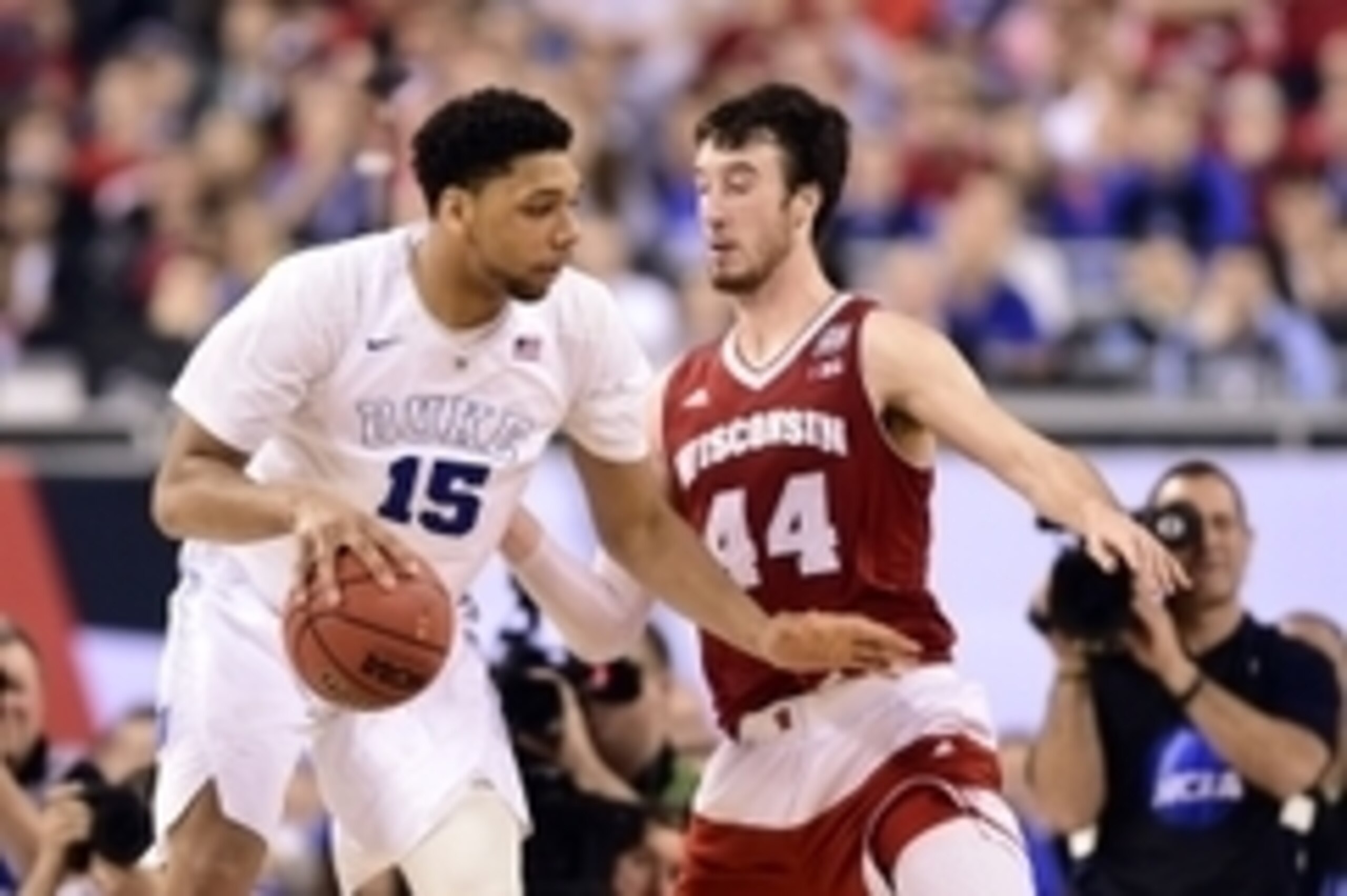 Apr 6, 2015; Indianapolis, IN, USA; Duke Blue Devils center Jahlil Okafor (15) drives against Wisconsin Badgers forward Frank Kaminsky (44) in the second half in the 2015 NCAA Men's Division I Championship game at Lucas Oil Stadium. Mandatory Credit: Bob 