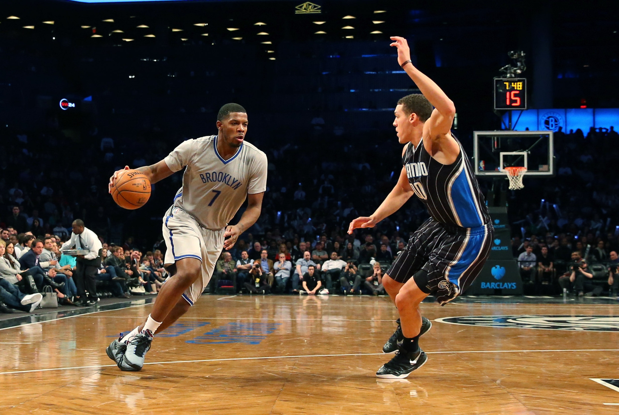 Apr 15, 2015; Brooklyn, NY, USA; Brooklyn Nets forward Joe Johnson (7) drives past Orlando Magic forward Aaron Gordon (00) during the third quarter at Barclays Center. Brooklyn Nets won 101-88. Mandatory Credit: Anthony Gruppuso-USA TODAY Sports Apr 15, 2015; Brooklyn, NY, USA; Brooklyn Nets forward Joe Johnson (7) drives past Orlando Magic forward Aaron Gordon (00) during the third quarter at Barclays Center. Brooklyn Nets won 101-88. Mandatory Credit: Anthony Gruppuso-USA TODAY Sports