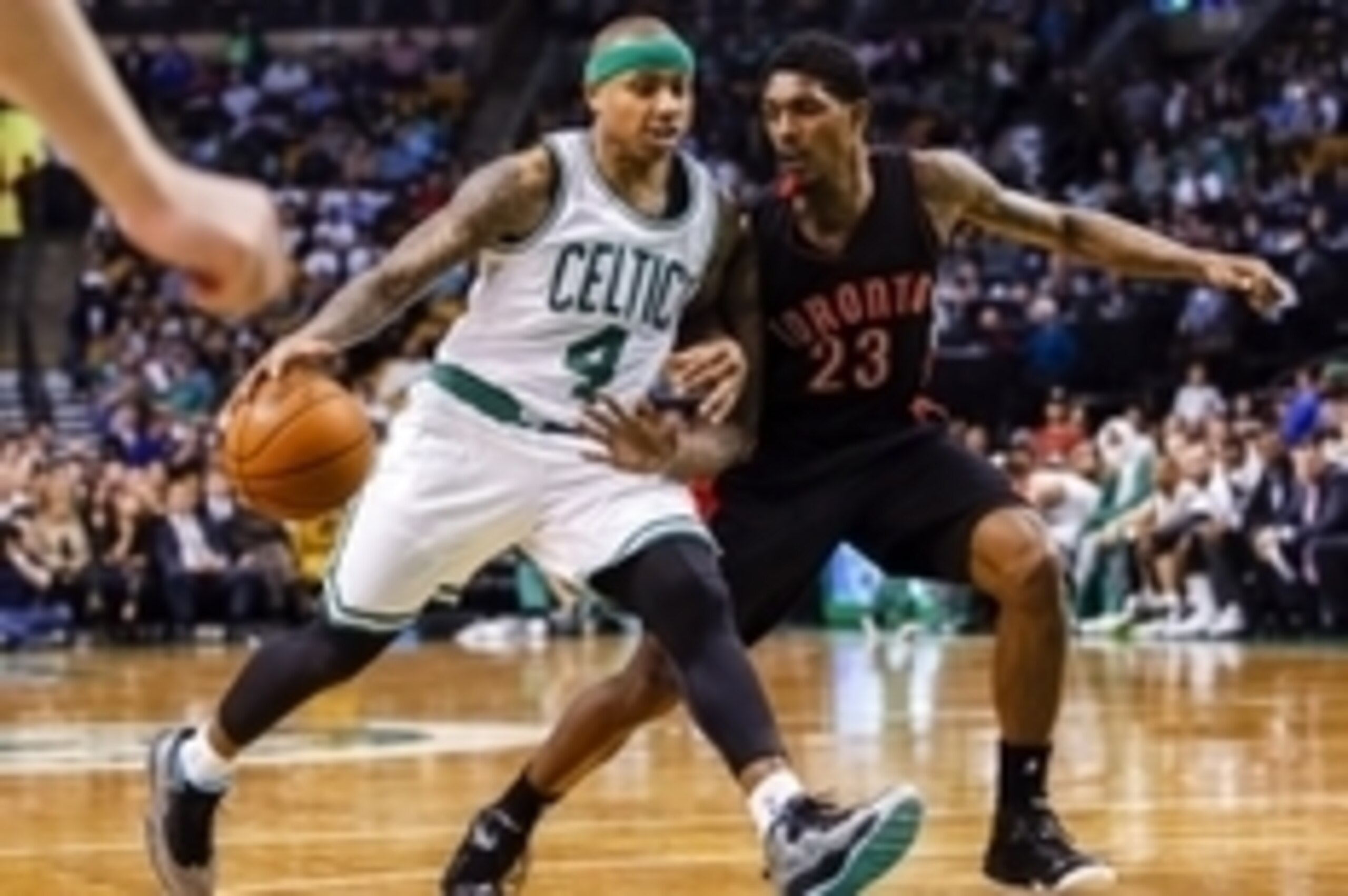 Apr 14, 2015; Boston, MA, USA; Boston Celtics guard Isaiah Thomas (4) drives the ball against Toronto Raptors guard Louis Williams (23) in the second half at TD Garden. The Celtics defeated the Toronto Raptors 95-93. Mandatory Credit: David Butler II-USA 