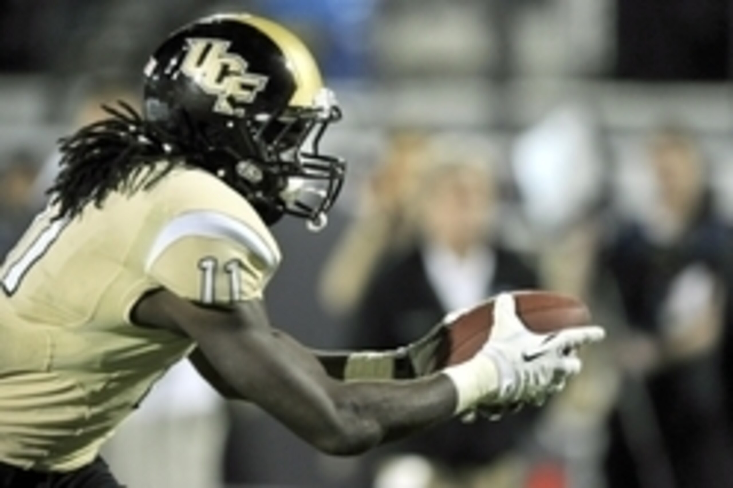 Nov 29, 2013; Orlando, FL, USA;UCF Knights wide receiver Breshad Perriman (11) dives across the goal line scoring the winning touchdown over the South Florida Bulls  late in the fourth quarter at Bright House Networks Stadium. UCF defeated South Florida 2