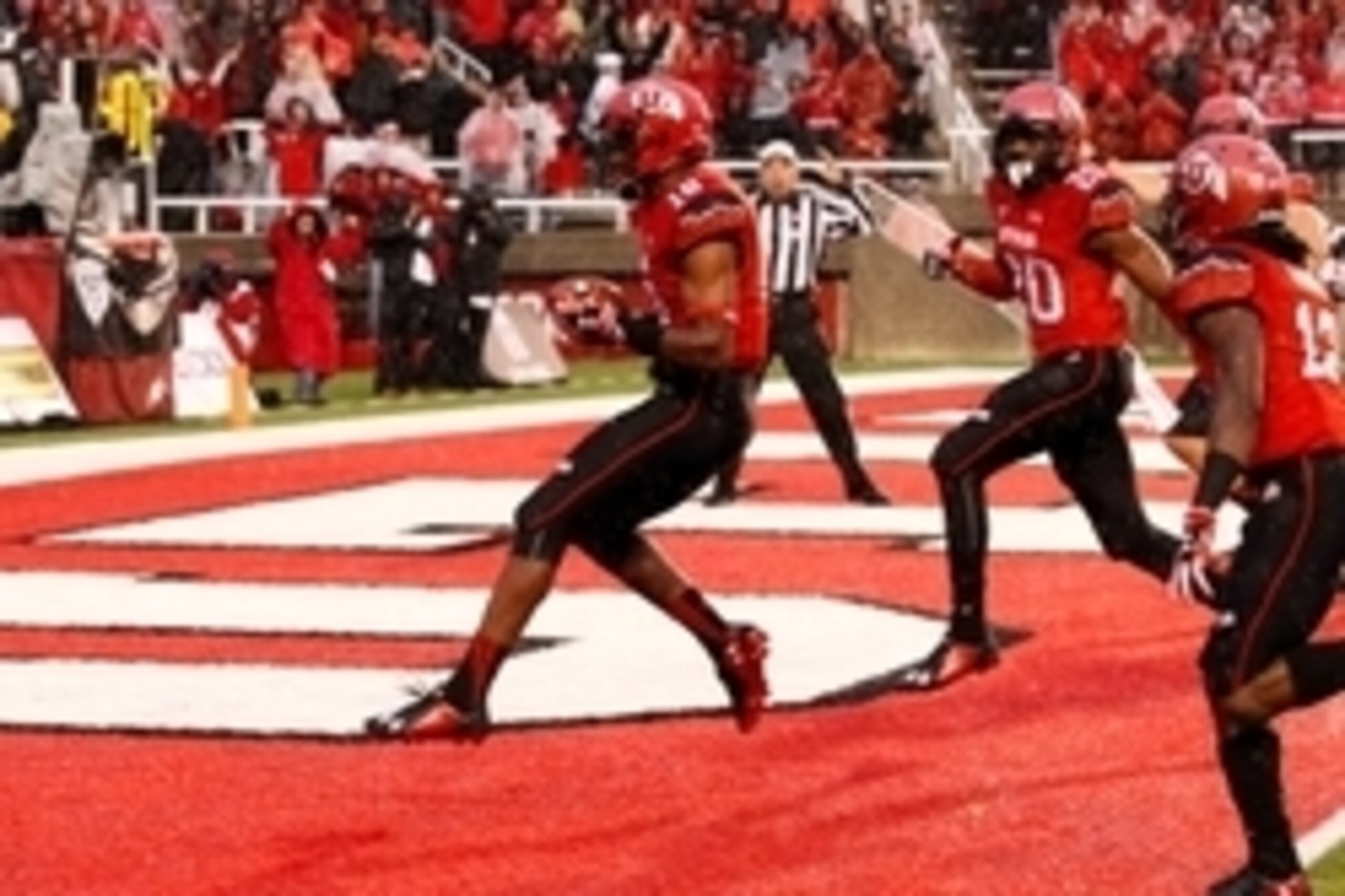 Sep 27, 2014; Salt Lake City, UT, USA; Utah Utes defensive back Eric Rowe (18) intercepts the football and runs into the end zone during the first quarter against the Washington State Cougars at Rice-Eccles Stadium. Mandatory Credit: Chris Nicoll-USA TODA