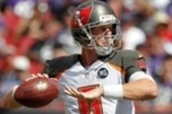 Oct 12, 2014; Tampa, FL, USA; Tampa Bay Buccaneers quarterback Mike Glennon (8) throws the ball against the Baltimore Ravens during the first half at Raymond James Stadium. Mandatory Credit: Kim Klement-USA TODAY Sports