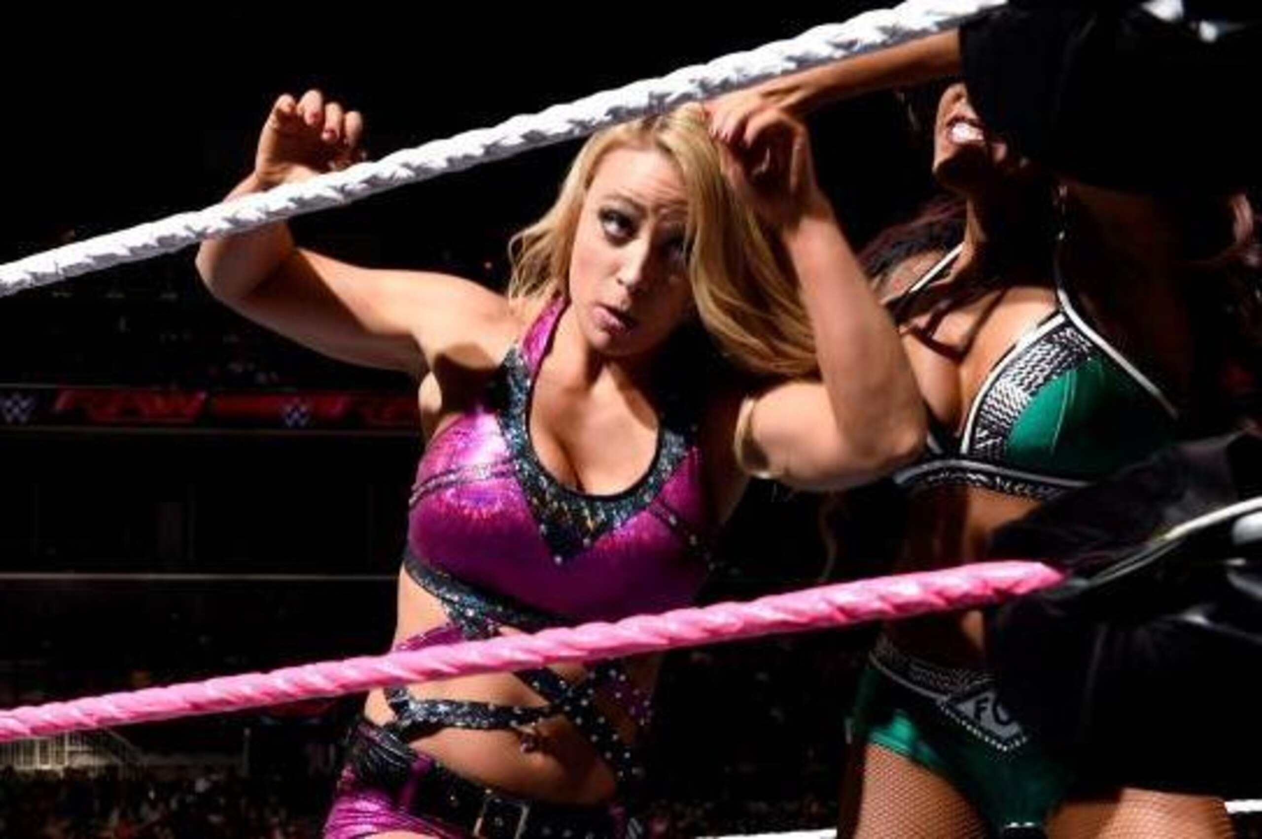 Alicia Fox attacks Emma.