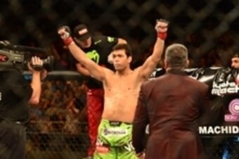 Dec 20, 2014; Barueri, SP, Brazil; Lyoto Machida (red gloves) before his fight against C.B. Dollaway (blue gloves) during UFC Fight Night at Jose Correa Arena. Mandatory Credit: Jason Silva-USA TODAY Sports