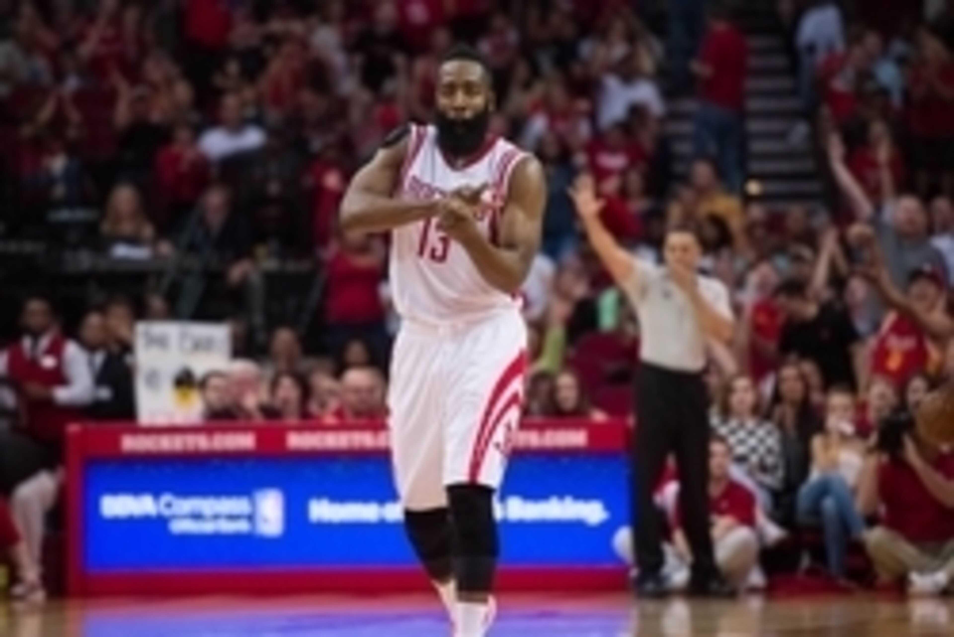 Apr 12, 2015; Houston, TX, USA; Houston Rockets guard James Harden (13) celebrates making a three point shot against the New Orleans Pelicans during the second quarter at the Toyota Center. Mandatory Credit: Jerome Miron-USA TODAY Sports