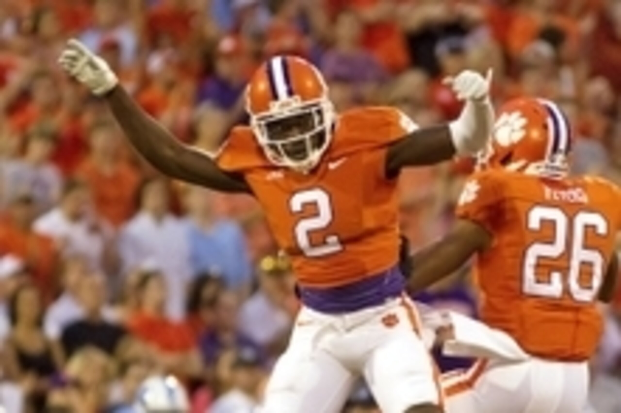 Sep 27, 2014; Clemson, SC, USA; Clemson Tigers cornerback MacKensie Alexander (2) and cornerback Garry Peters (26) celebrate after breaking up a pass during the first quarter against the North Carolina Tar Heels at Clemson Memorial Stadium. Mandatory Cred