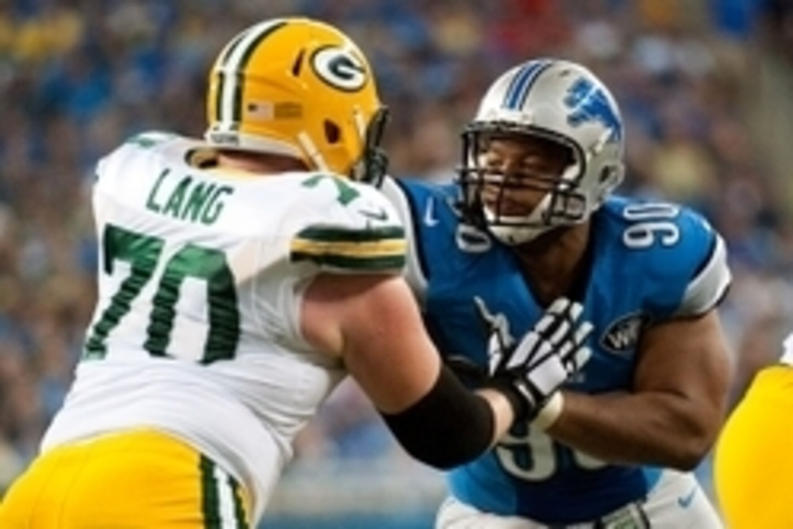 Sep 21, 2014; Detroit, MI, USA; Green Bay Packers guard T.J. Lang (70) blocks Detroit Lions defensive tackle Ndamukong Suh (90) during the game at Ford Field. Mandatory Credit: Tim Fuller-USA TODAY Sports