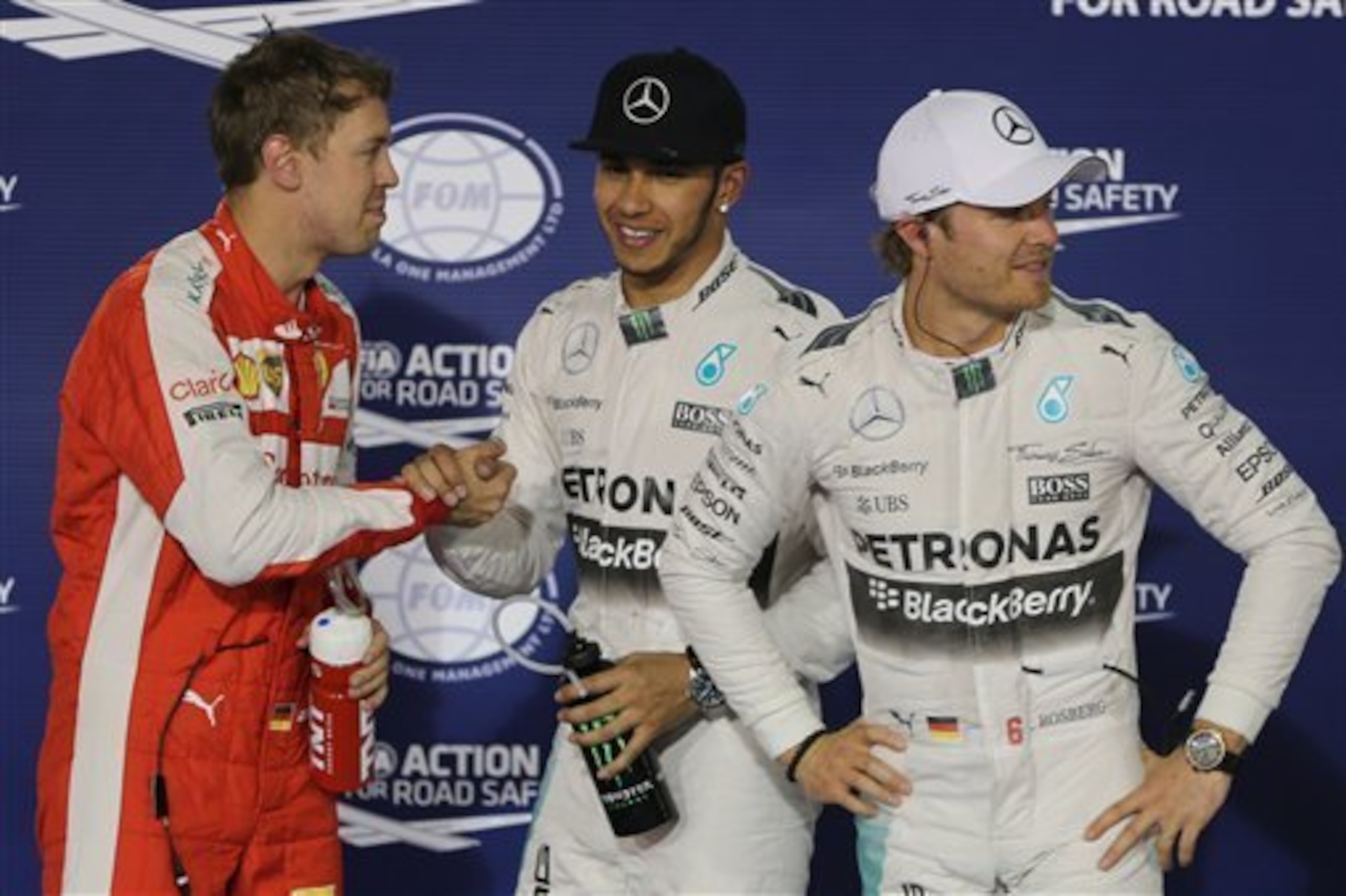 Sebastian Vettel, Lewis Hamilton and Nico Rosberg after qualifying.