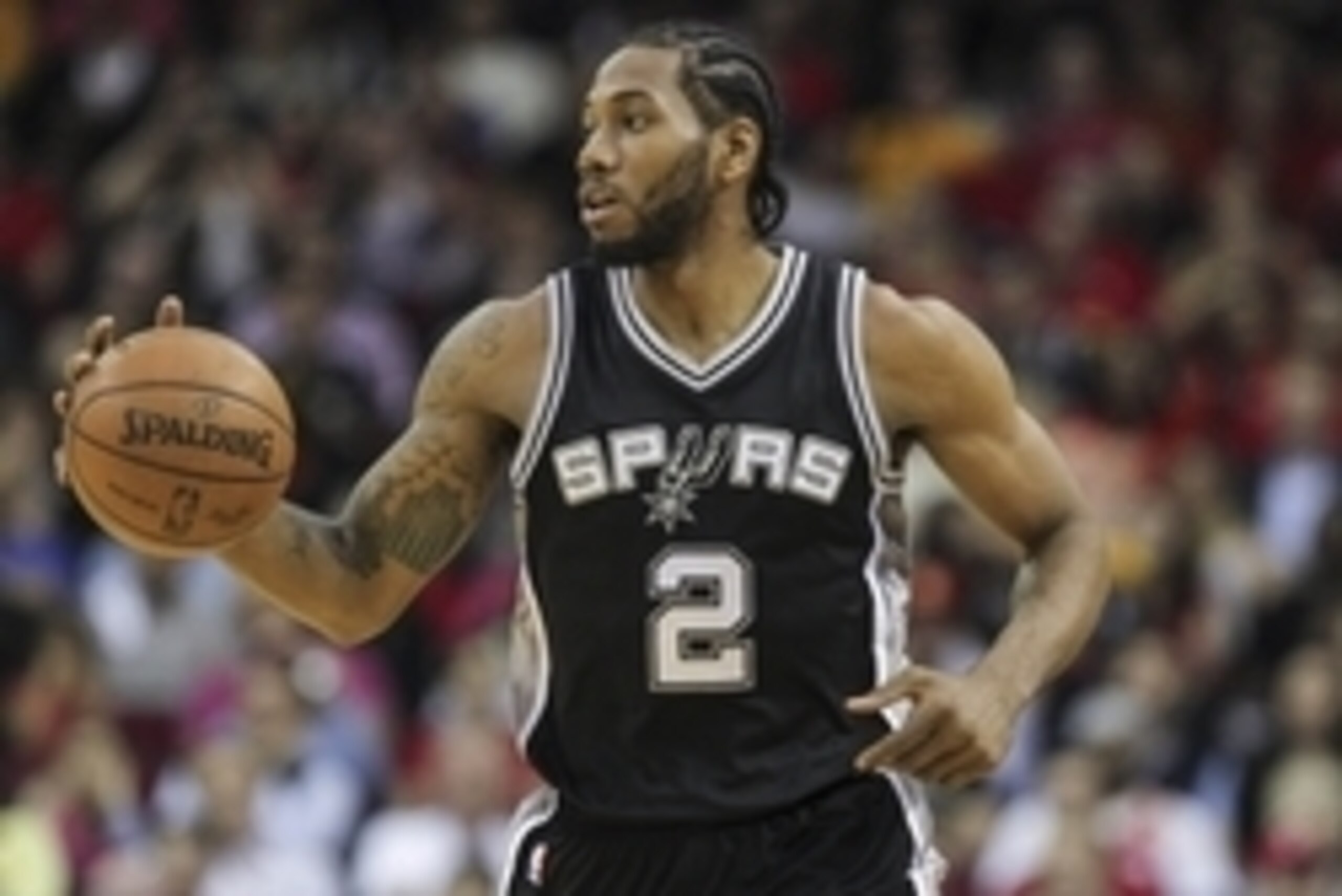 Apr 10, 2015; Houston, TX, USA; San Antonio Spurs forward Kawhi Leonard (2) dribbles the ball during the second quarter against the Houston Rockets at Toyota Center. Mandatory Credit: Troy Taormina-USA TODAY Sports Apr 10, 2015; Houston, TX, USA; San Antonio Spurs forward Kawhi Leonard (2) dribbles the ball during the second quarter against the Houston Rockets at Toyota Center. Mandatory Credit: Troy Taormina-USA TODAY Sports