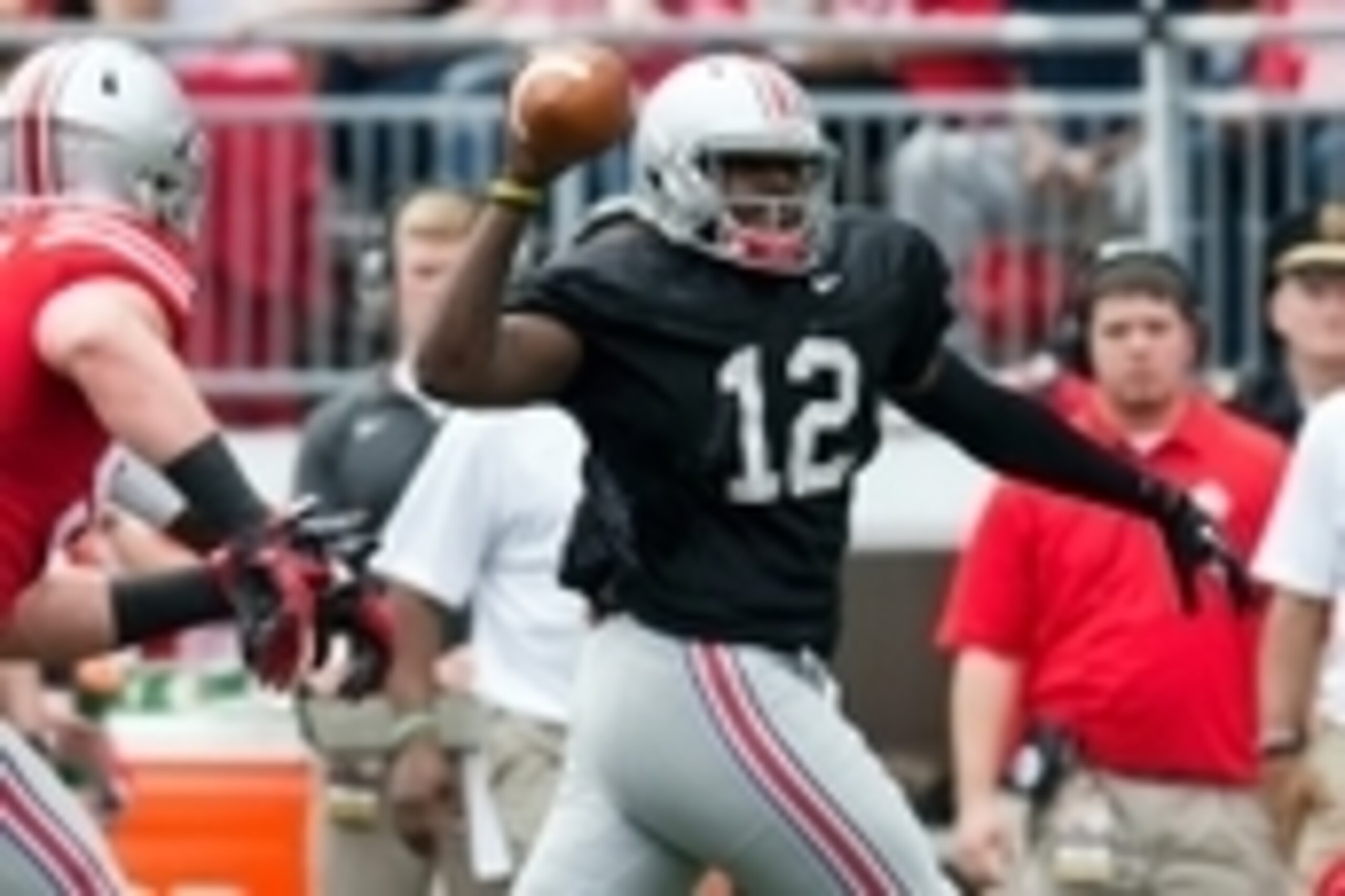 Apr 18, 2015; Columbus, OH, USA; Ohio State Gray Team quarterback Cardale Jones (12) fires a pass upfield during the Ohio State Spring Game at Ohio Stadium. The Gray team won the game 17-14. Mandatory Credit: Greg Bartram-USA TODAY Sports