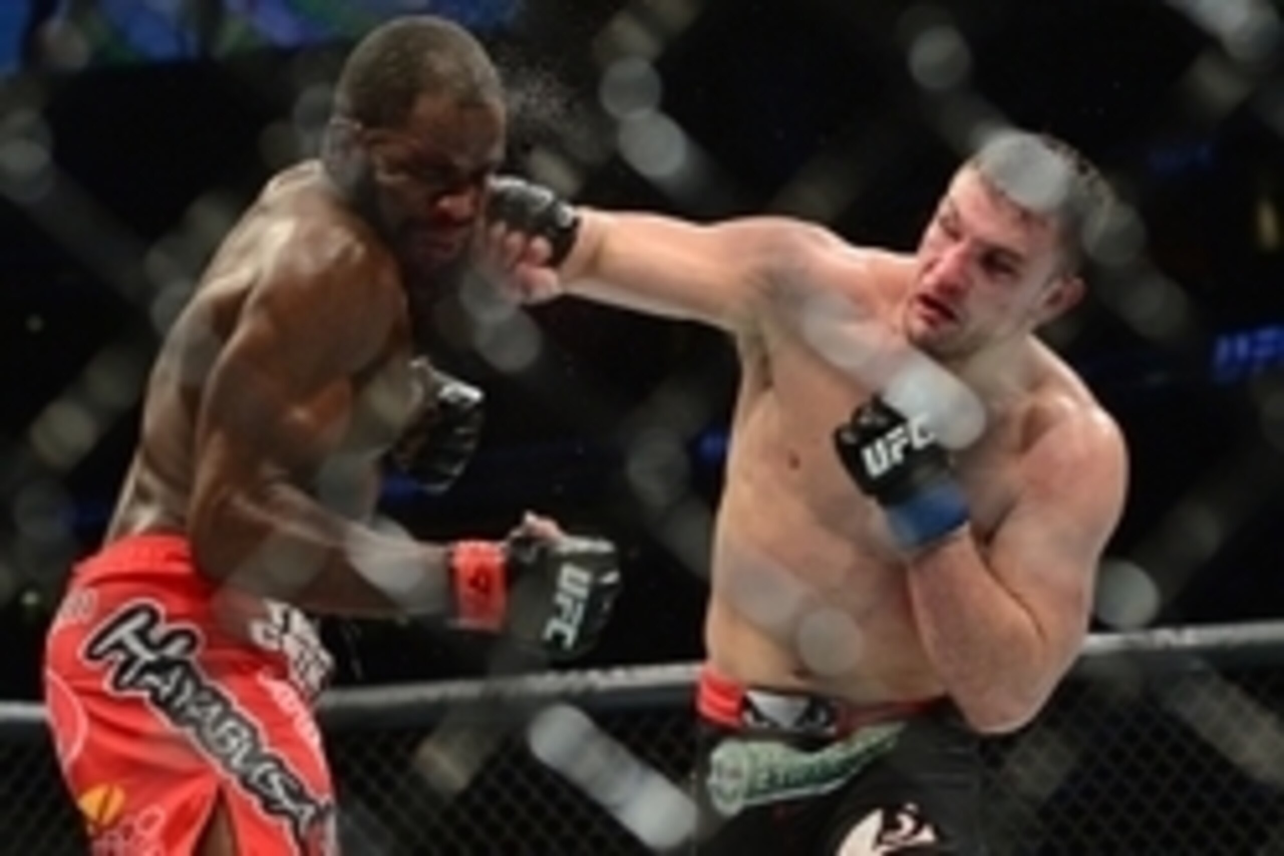 Apr 18, 2015; Newark, NJ, USA; Corey Anderson (red) and Gian Villante (blue) fight during UFC Fight Night at Prudential Center. Villante won via third round TKO. Mandatory Credit: Joe Camporeale-USA TODAY Sports