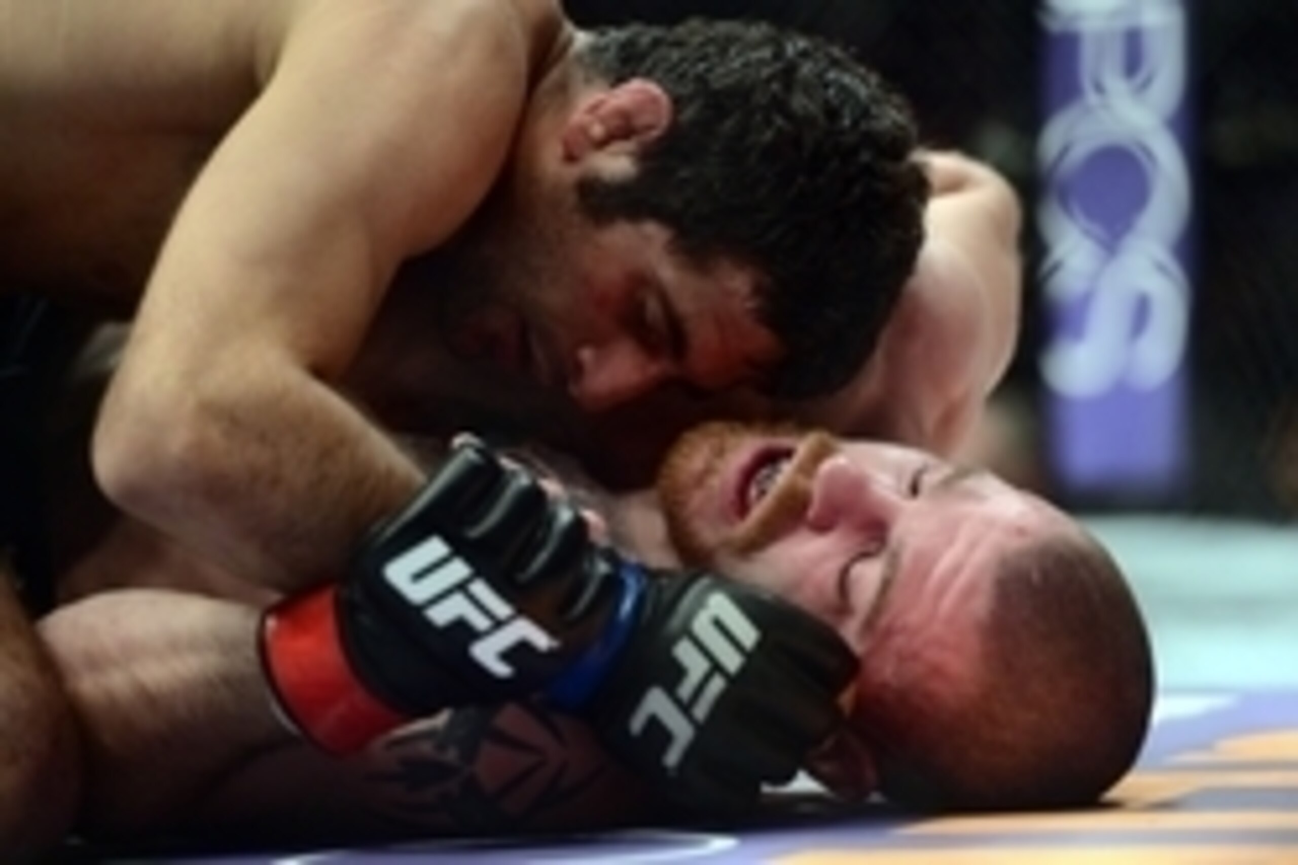 Apr 18, 2015; Newark, NJ, USA; Jim Miller (red) and Deneil Dariush (blue) fight during UFC Fight Night at Prudential Center. Dariush won via unanimous decision. Mandatory Credit: Joe Camporeale-USA TODAY Sports