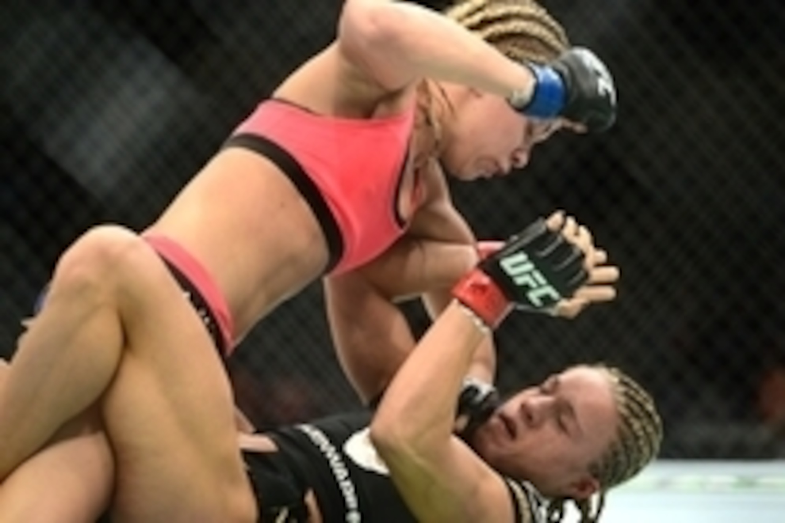 Apr 18, 2015; Newark, NJ, USA; Felice Herrig (red) and Paige VanZant (blue) fight during UFC Fight Night at Prudential Center. VanZant won via unanimous decision. Mandatory Credit: Joe Camporeale-USA TODAY Sports