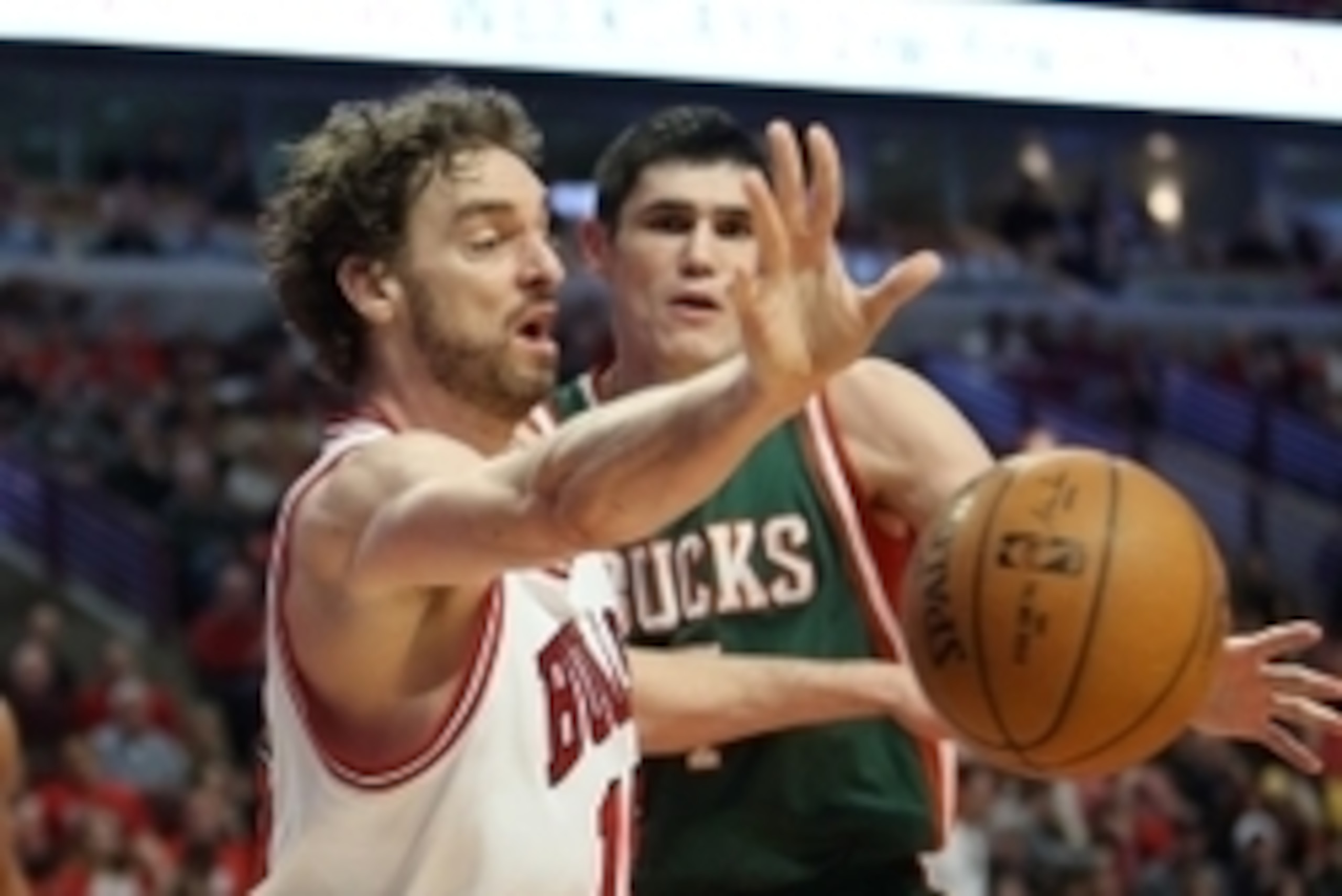 Apr 18, 2015; Chicago, IL, USA; Chicago Bulls forward Pau Gasol (16) passes the ball away from Milwaukee Bucks forward Ersan Ilyasova (7) during the third quarter in game one of the first round of the 2015 NBA Playoffs at United Center. Mandatory Credit: 