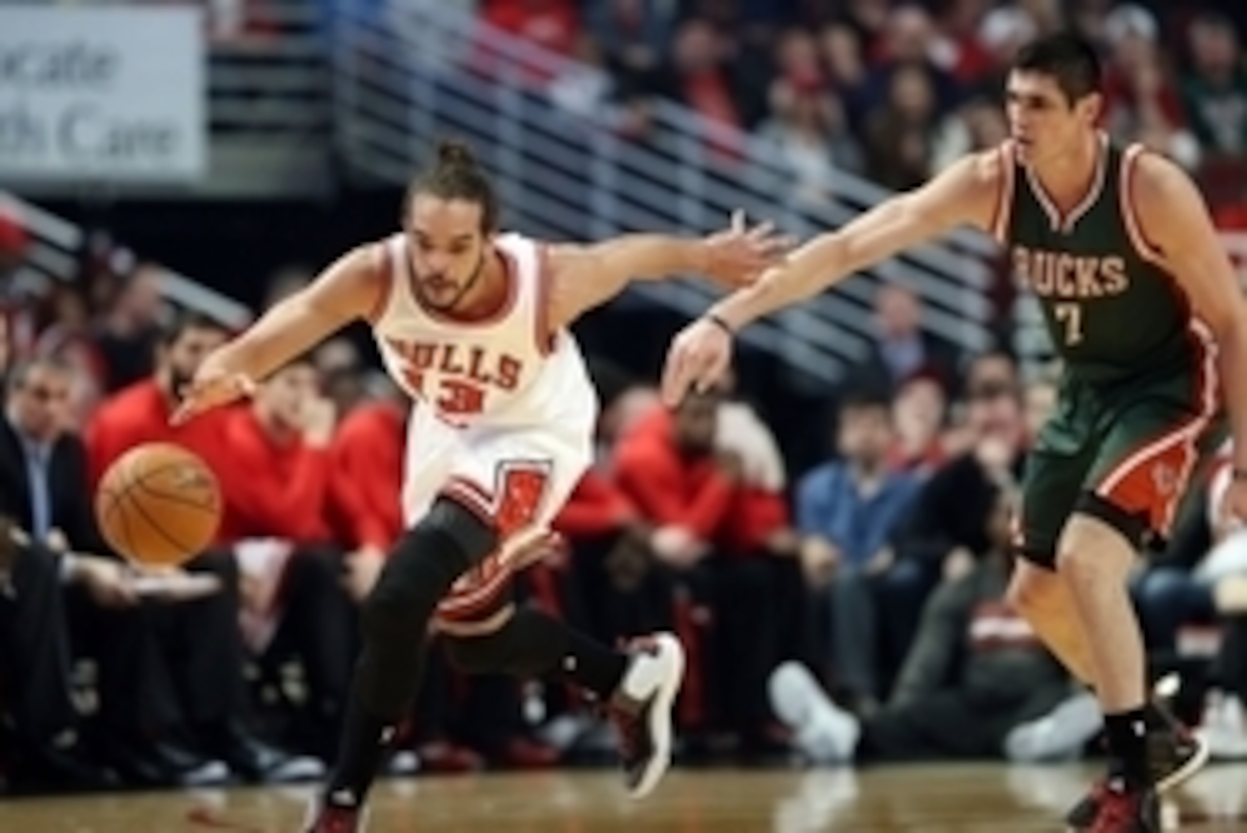 Apr 18, 2015; Chicago, IL, USA; Chicago Bulls center Joakim Noah (13) chases after the ball against Milwaukee Bucks forward Ersan Ilyasova (7) during the first quarter in game one of the first round of the 2015 NBA Playoffs at United Center. Mandatory Cre