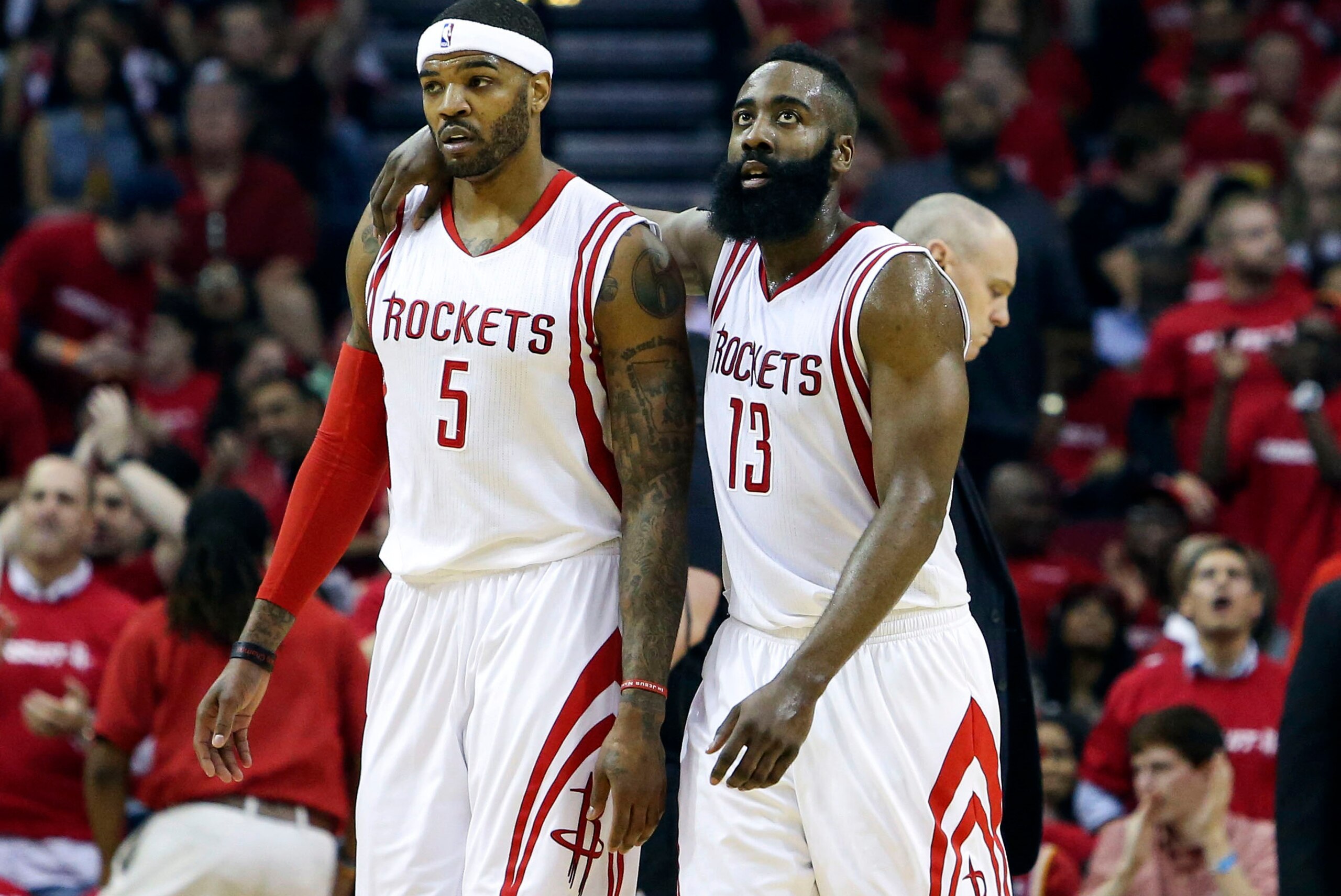 Apr 18, 2015; Houston, TX, USA; Houston Rockets forward Josh Smith (5) and guard James Harden (13) walk off the court after the end of the first quarter against the Dallas Mavericks in game one of the first round of the NBA Playoffs at Toyota Center. Mand