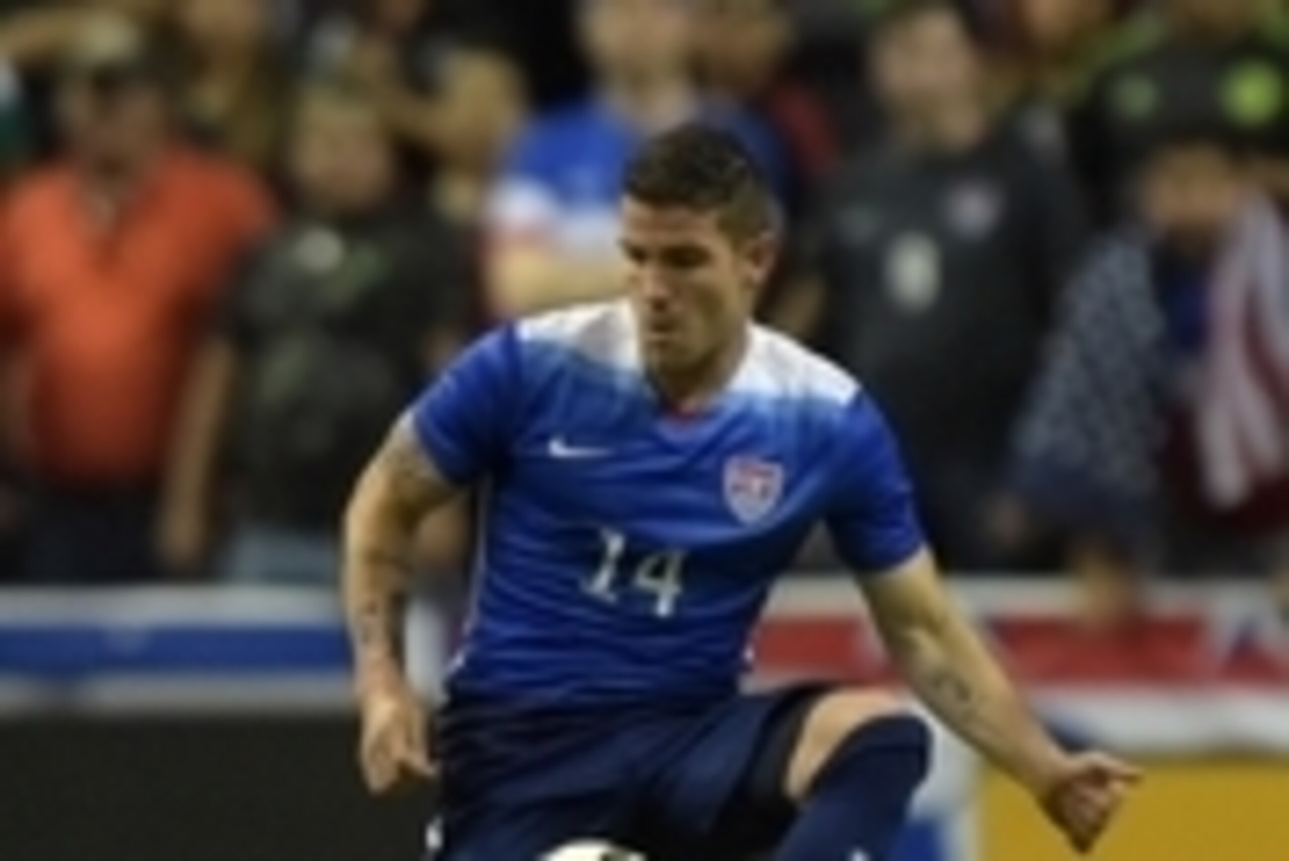 Apr 15, 2015; San Antonio, TX, USA; United States defender Greg Garza (14)  against Mexico in an international friendly at Alamodome. The United States defeated Mexico 2-0. Mandatory Credit: Kirby Lee-USA TODAY Sports