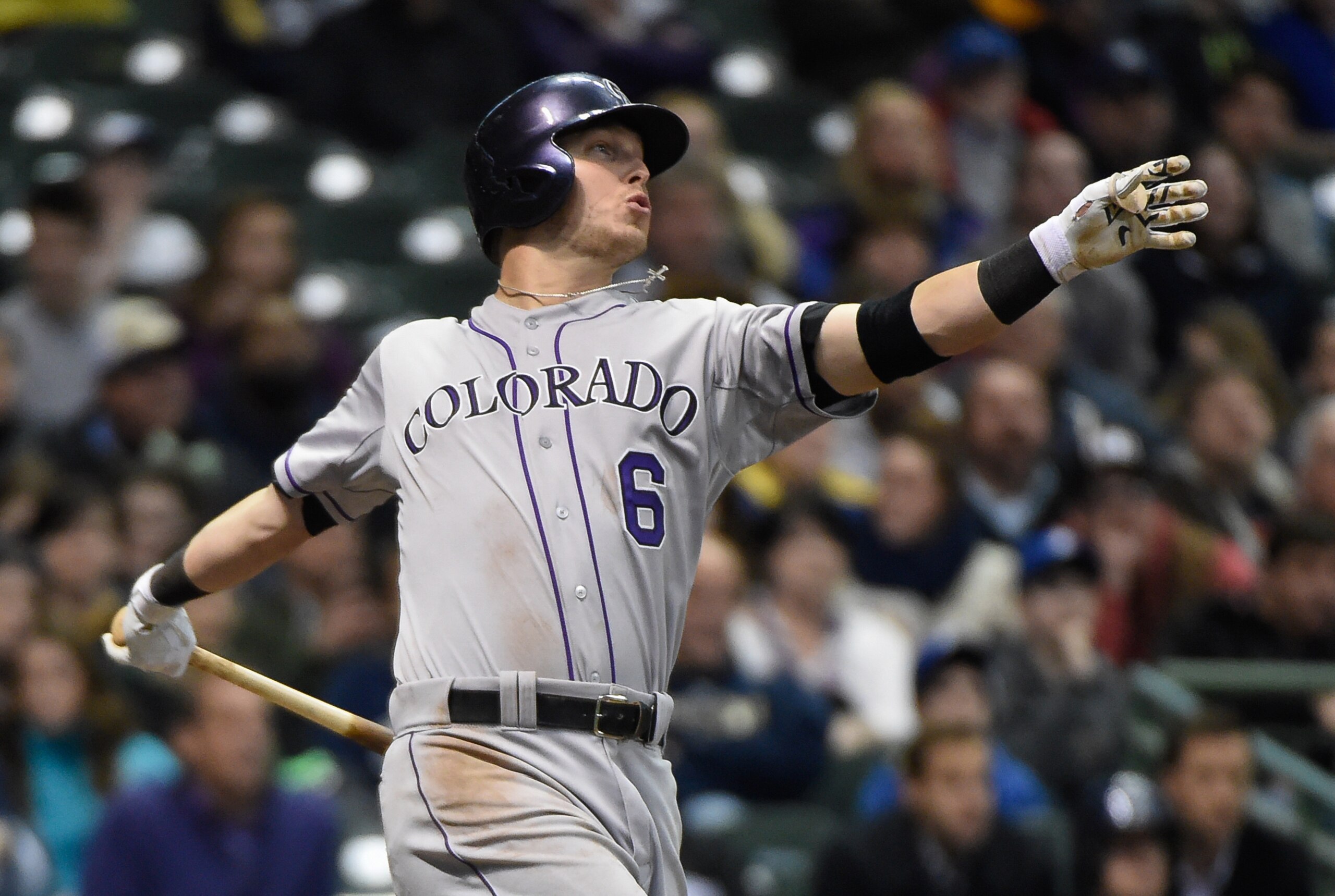 Apr 8, 2015; Milwaukee, WI, USA;  Colorado Rockies left fielder Corey Dickerson (6) hits a solo home run in the seventh inning against the Milwaukee Brewers at Miller Park. Mandatory Credit: Benny Sieu-USA TODAY Sports