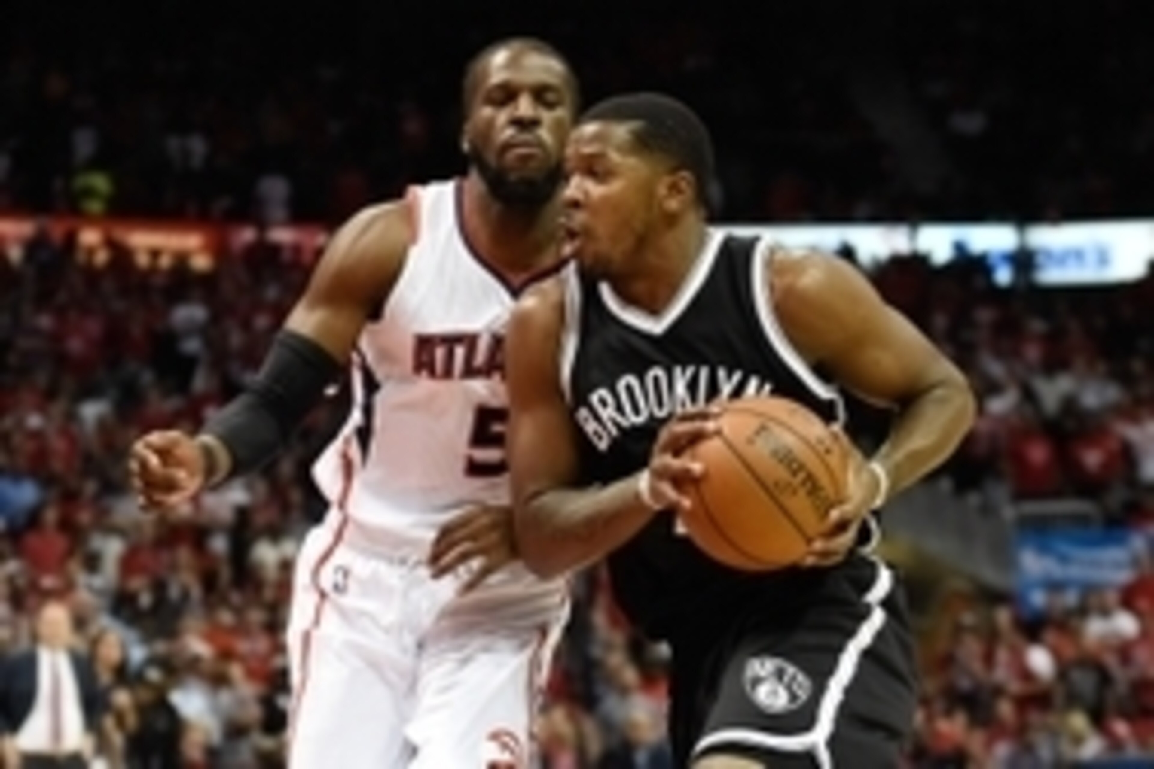 Apr 19, 2015; Atlanta, GA, USA; Brooklyn Nets forward Joe Johnson (7) works against Atlanta Hawks forward DeMarre Carroll (5) during the first half in game one of the first round of the NBA Playoffs at Philips Arena. Mandatory Credit: Dale Zanine-USA TODA