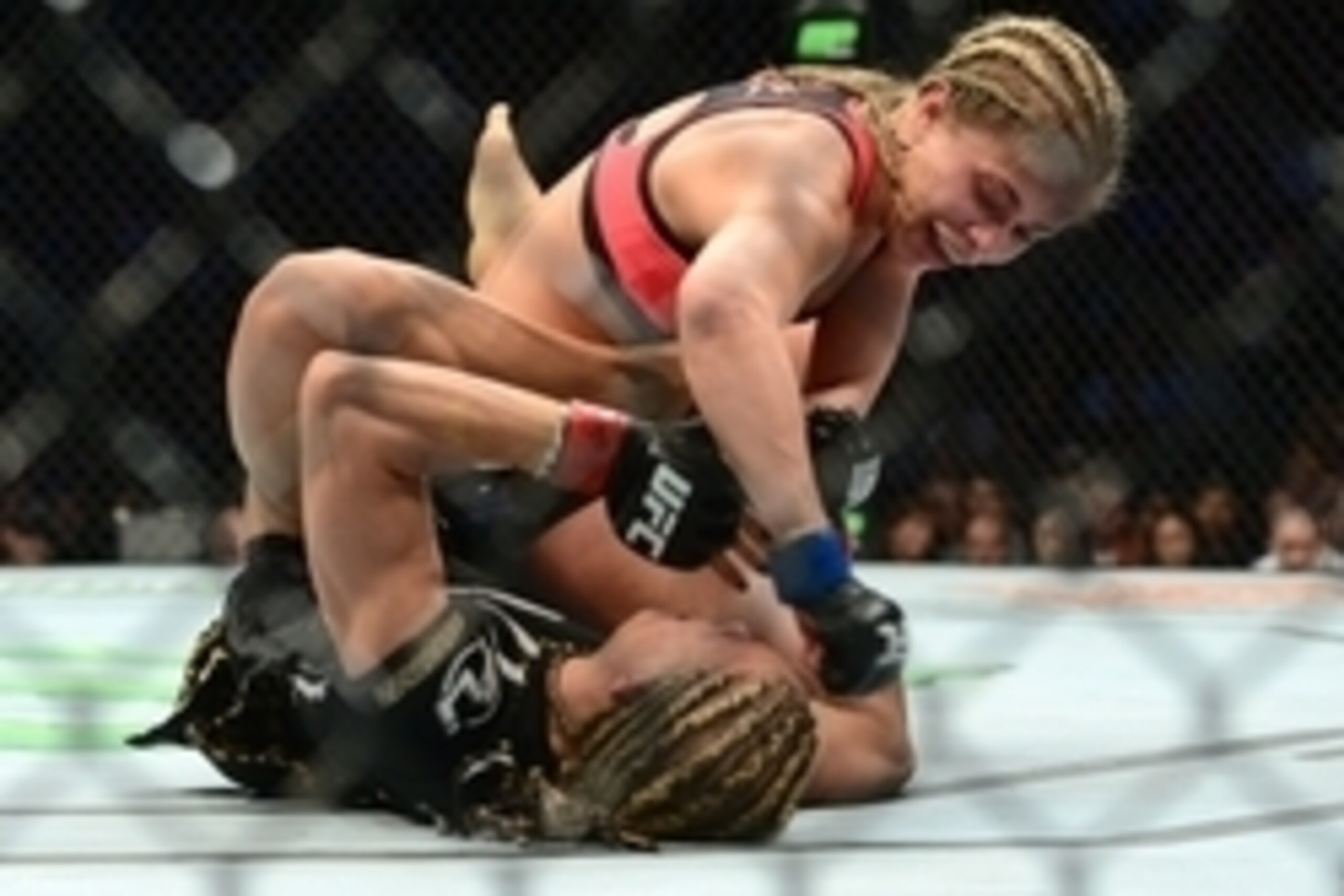 Apr 18, 2015; Newark, NJ, USA; Felice Herrig (red) and Paige VanZant (blue) fight during UFC Fight Night at Prudential Center. VanZant won via unanimous decision. Mandatory Credit: Joe Camporeale-USA TODAY Sports