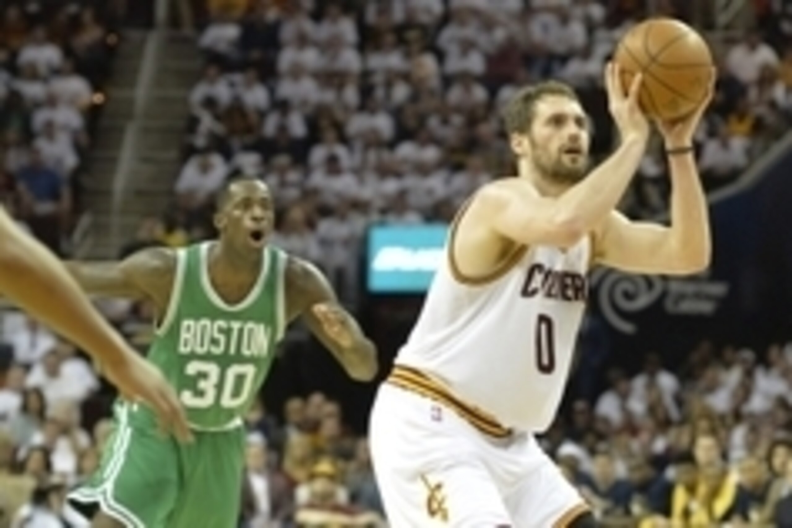Apr 19, 2015; Cleveland, OH, USA; Cleveland Cavaliers forward Kevin Love (0) shoots beside Boston Celtics forward Brandon Bass (30) in the second quarter in game one of the first round of the NBA Playoffs at Quicken Loans Arena. Mandatory Credit: David Ri Apr 19, 2015; Cleveland, OH, USA; Cleveland Cavaliers forward Kevin Love (0) shoots beside Boston Celtics forward Brandon Bass (30) in the second quarter in game one of the first round of the NBA Playoffs at Quicken Loans Arena. Mandatory Credit: David Ri