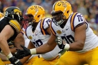 Jan 1, 2014; Tampa, Fl, USA; LSU Tigers offensive tackle La'el Collins (70) blocks against theIowa Hawkeyes during the first half at Raymond James Stadium. Mandatory Credit: Kim Klement-USA TODAY Sports