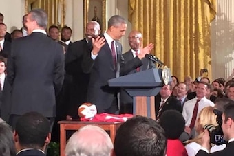 Barack Obama imitates Joey Bosa's signature shrug.