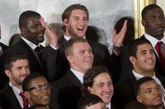 Joey Bosa shrugs for Barack Obama at the White House.