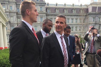 Urban Meyer outside the White House with Ohio State's 2014 captains.