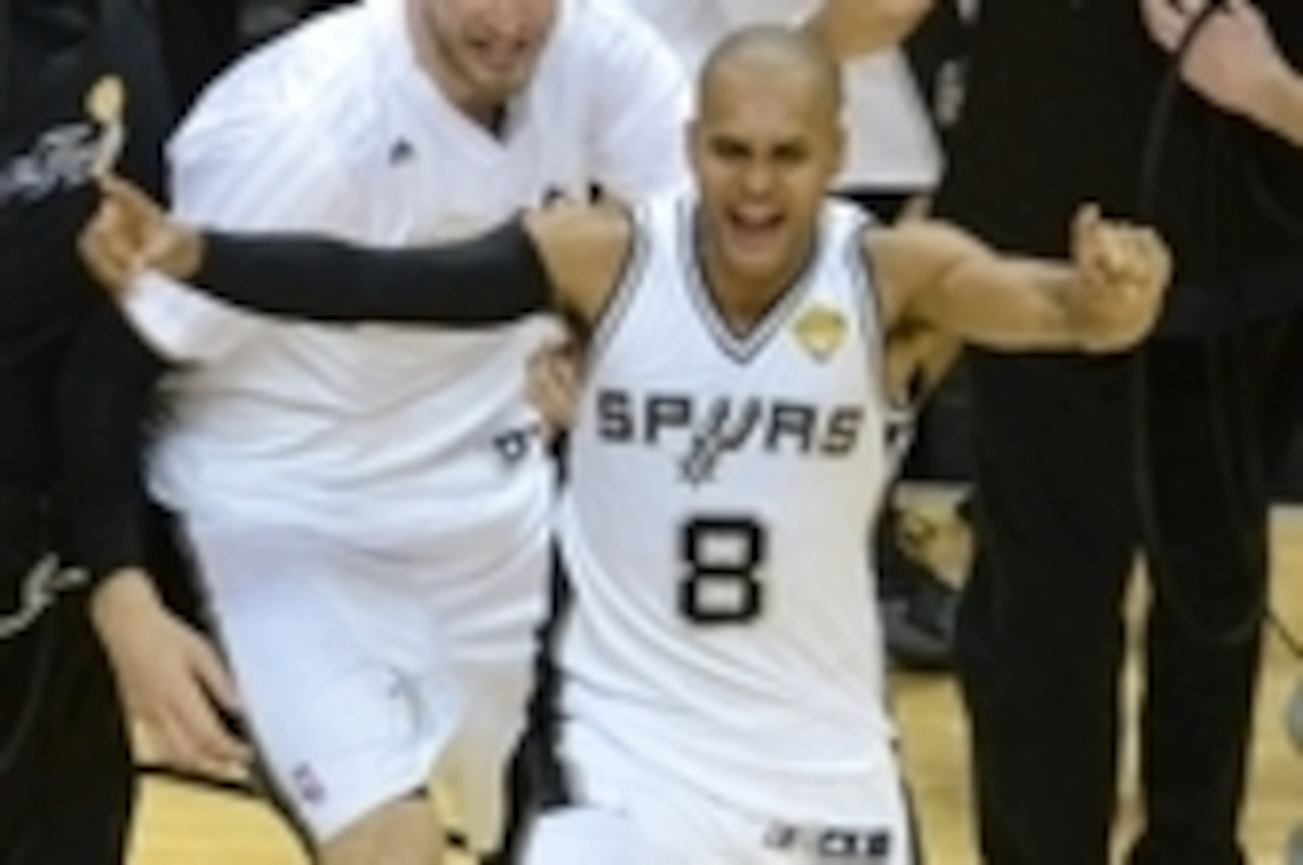 Jun15, 2014; San Antonio, TX, USA; San Antonio Spurs guard Patty Mills (8) celebrates after the Spurs defeated the Miami Heat in game five of the 2014 NBA Finals at AT&T Center. The Spurs defeated Miami 104-87 to win the NBA Finals. Mandatory Credit: Bren