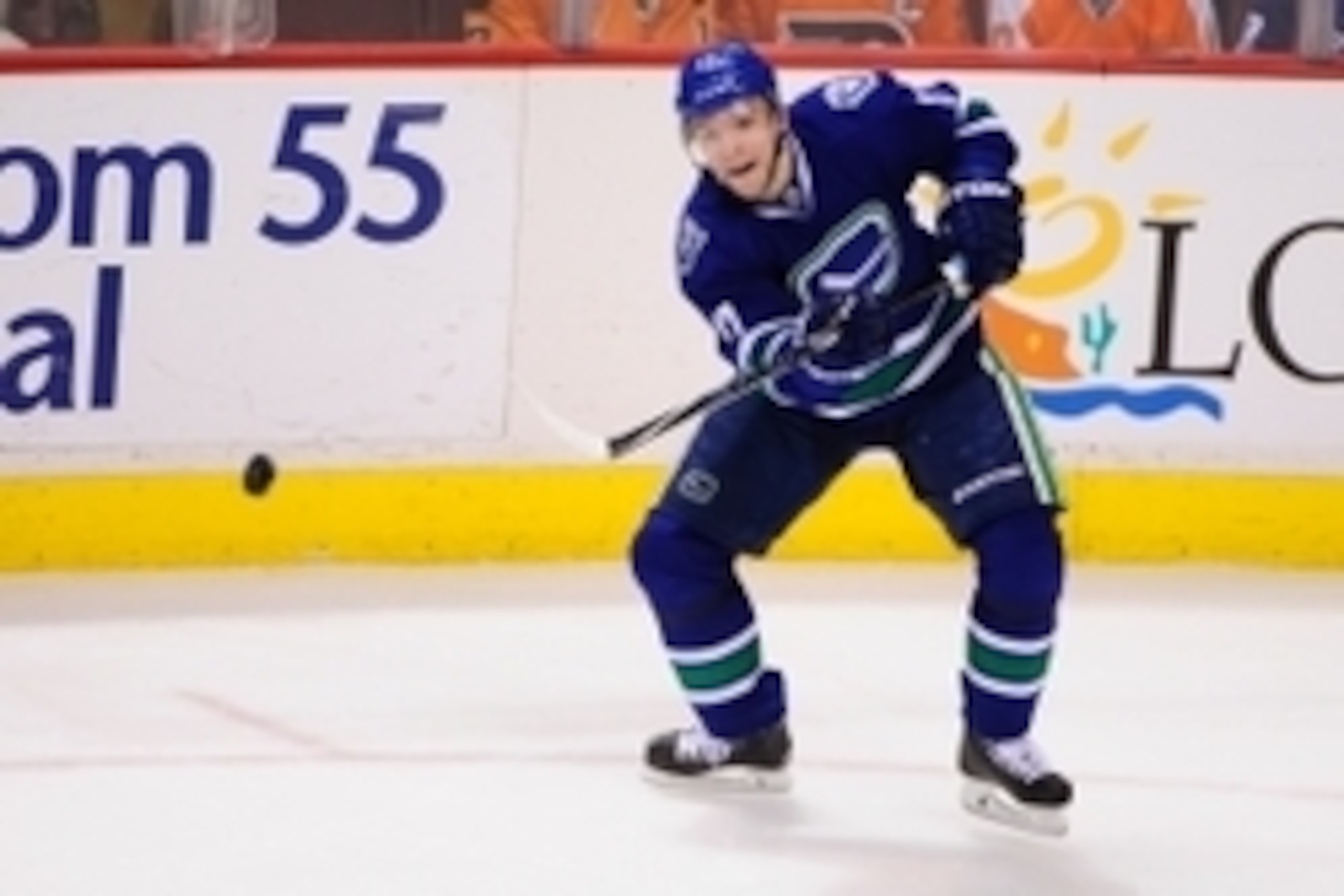 Mar 17, 2015; Vancouver, British Columbia, CAN; Vancouver Canucks forward Radim Vrbata (17) passes the puck against the Philadelphia Flyers during the first period at Rogers Arena. The Vancouver Canucks won 4-1. Mandatory Credit: Anne-Marie Sorvin-USA TOD