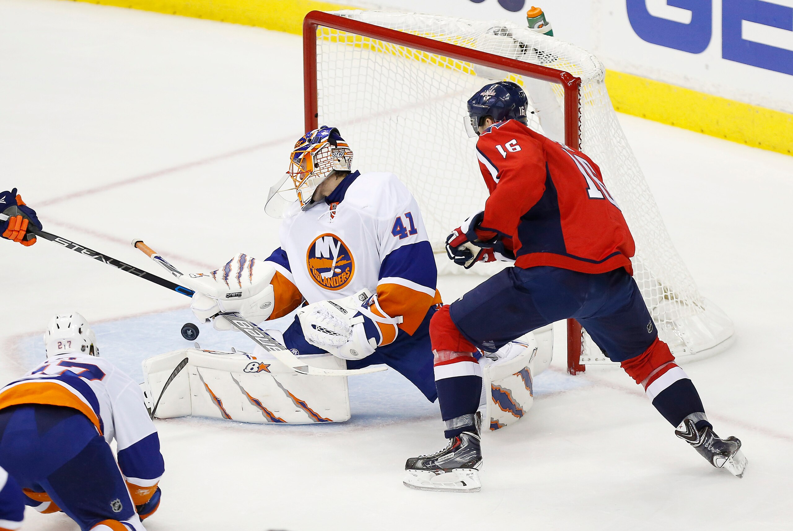 Apr 17, 2015; Washington, DC, USA; New York Islanders goalie Jaroslav Halak (41) makes a save in front of Washington Capitals right wing Eric Fehr (16) in the third period in game two of the first round of the the 2015 Stanley Cup Playoffs at Verizon Cent