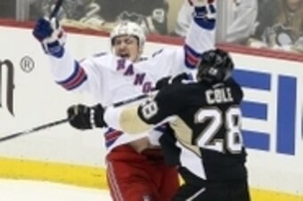 Apr 20, 2015; Pittsburgh, PA, USA; New York Rangers left wing Chris Kreider (20) celebrates scoring against the Pittsburgh Penguins as Pens defenseman Ian Cole (28) reacts during the second period in game three of the first round of the 2015 Stanley Cup P