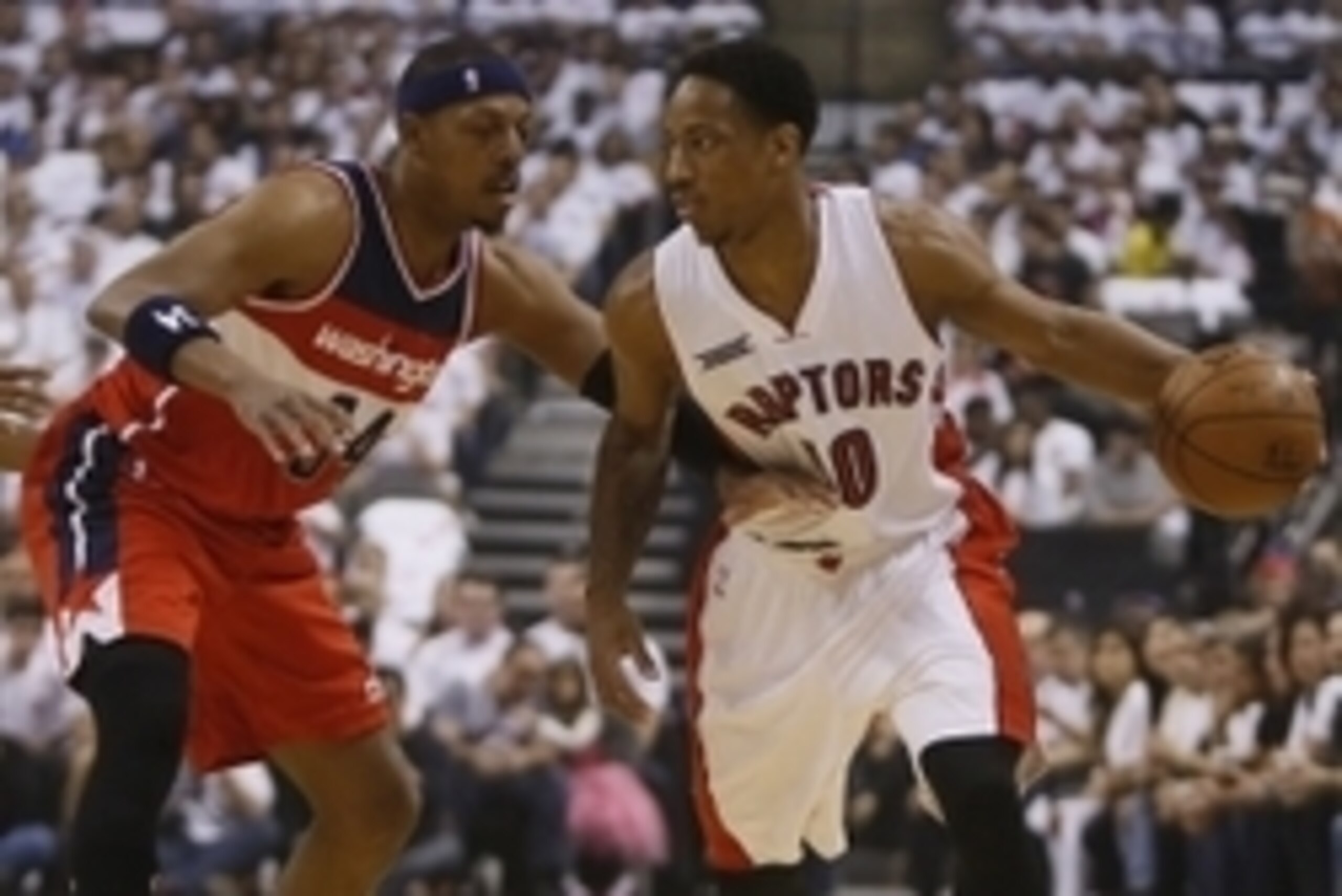 Apr 18, 2015; Toronto, Ontario, CAN; Toronto Raptors guard DeMar DeRozan (10) controls the ball against Washington Wizards forward Paul Pierce (34) during the first half in game one of the first round of the NBA Playoffs at Air Canada Centre. Mandatory Cr