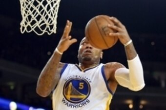 Apr 15, 2015; Oakland, CA, USA; Golden State Warriors center Marreese Speights (5) controls the ball against the Denver Nuggets during the third quarter at Oracle Arena. The Golden State Warriors defeated the Denver Nuggets 133-126. Mandatory Credit: Kell