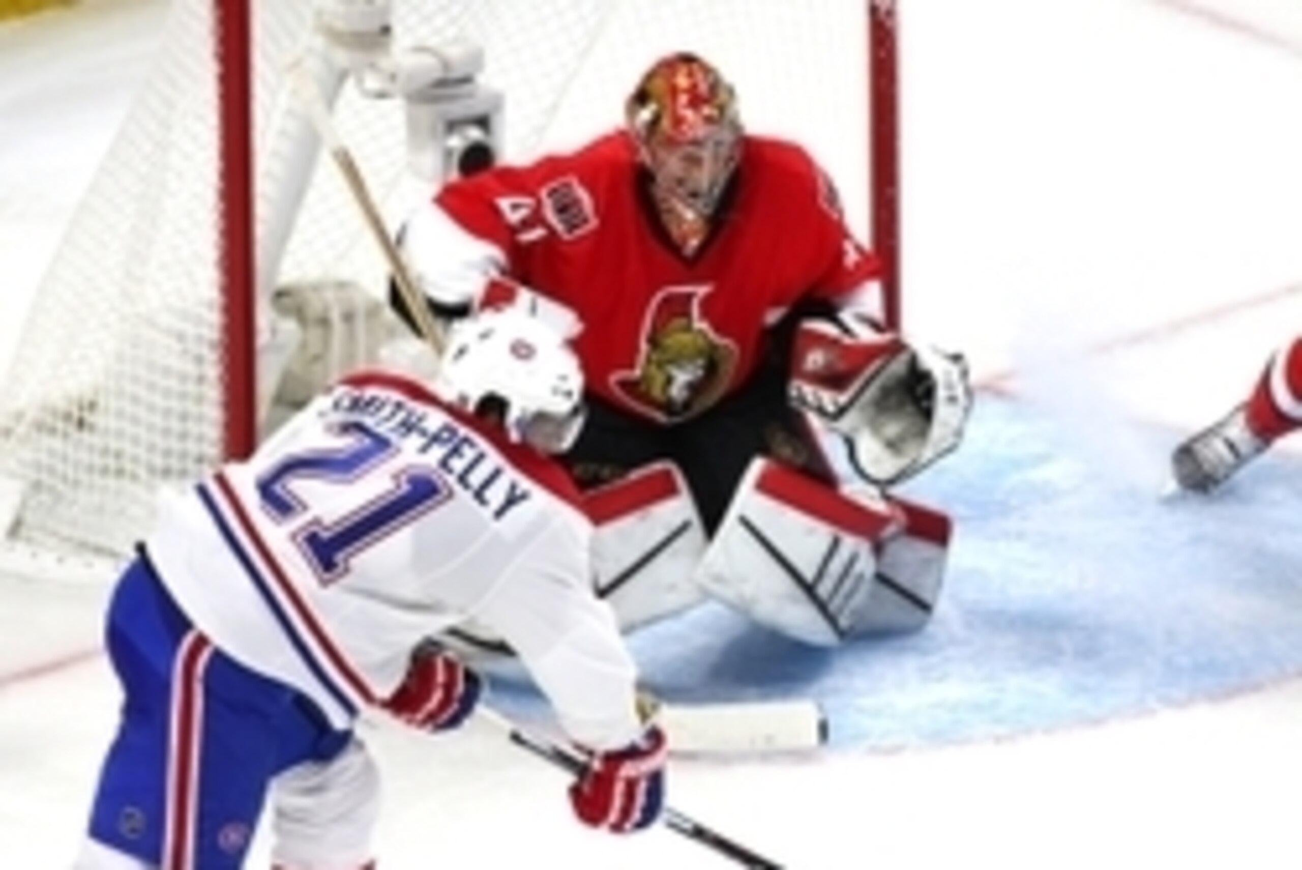 Apr 19, 2015; Ottawa, Ontario, CAN; Montreal Canadiens right wing Devante Smith-Pelly (21) shoots on Ottawa Senators goalie Craig Anderson (41) during the second period in game three of the first round of the 2015 Stanley Cup Playoffs at Canadian Tire Cen