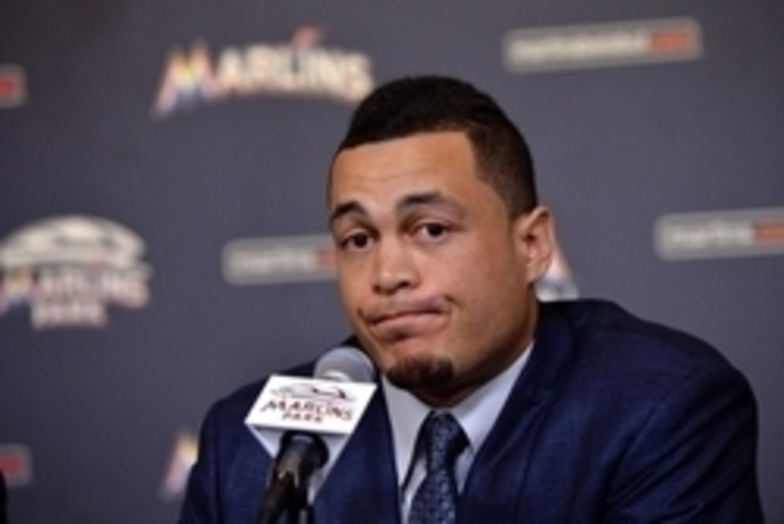 Nov 19, 2014; Miami, FL, USA; Miami Marlins right fielder Giancarlo Stanton listens during a press conference at Marlins Park. Mandatory Credit: Steve Mitchell-USA TODAY Sports