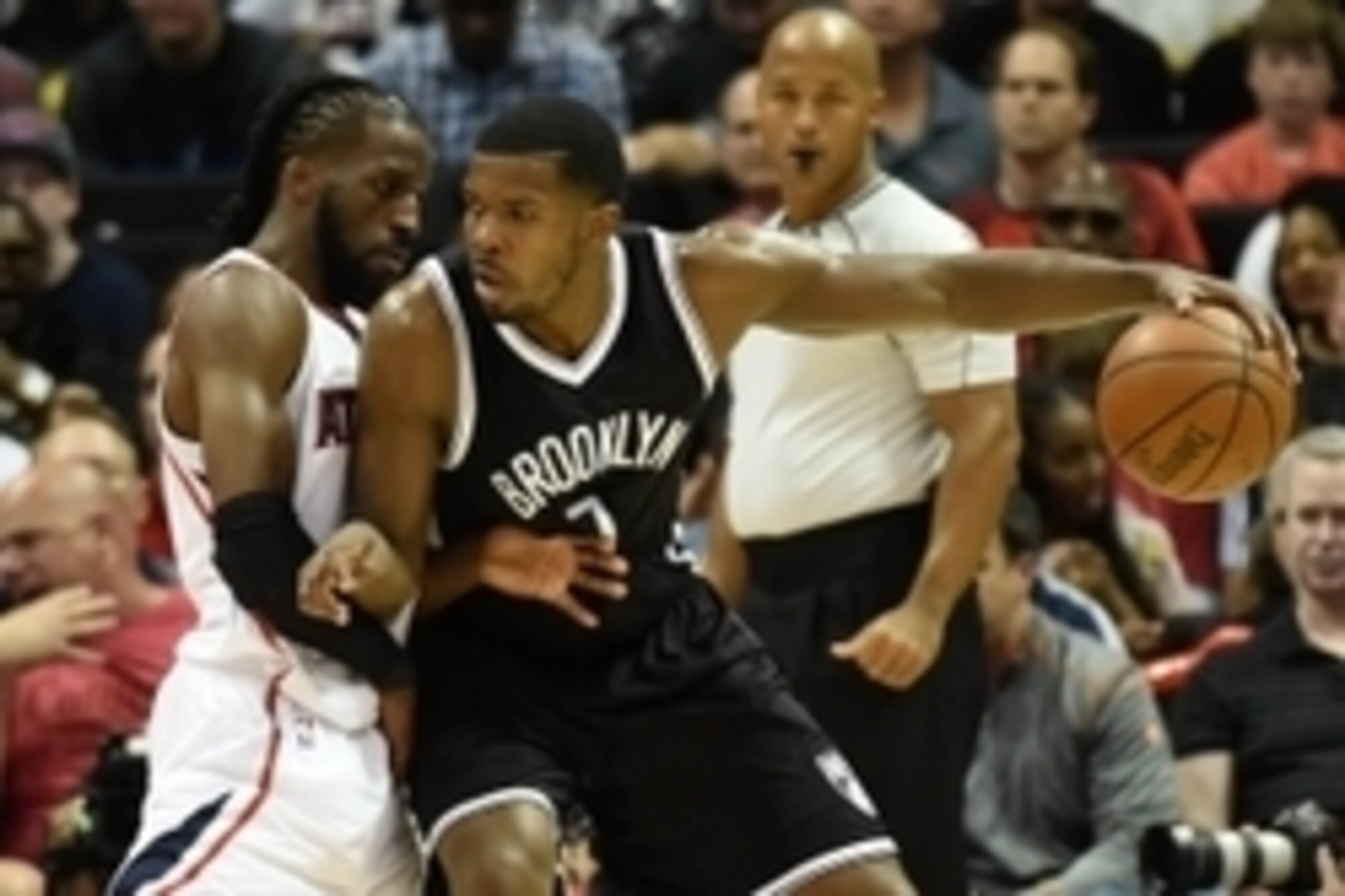 Apr 19, 2015; Atlanta, GA, USA; Brooklyn Nets forward Joe Johnson (7) works against Atlanta Hawks forward DeMarre Carroll (5) during the second half in game one of the first round of the NBA Playoffs at Philips Arena. The Hawks defeated the Nets 99-92. Ma