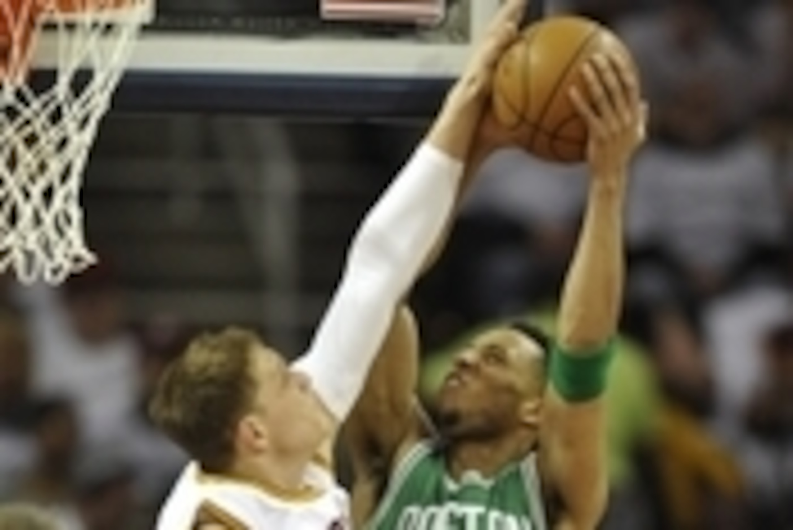 Apr 21, 2015; Cleveland, OH, USA; Cleveland Cavaliers center Timofey Mozgov (20) blocks a shot by Boston Celtics guard Evan Turner (11) in the first quarter in game two of the first round of the NBA Playoffs at Quicken Loans Arena. Mandatory Credit: David