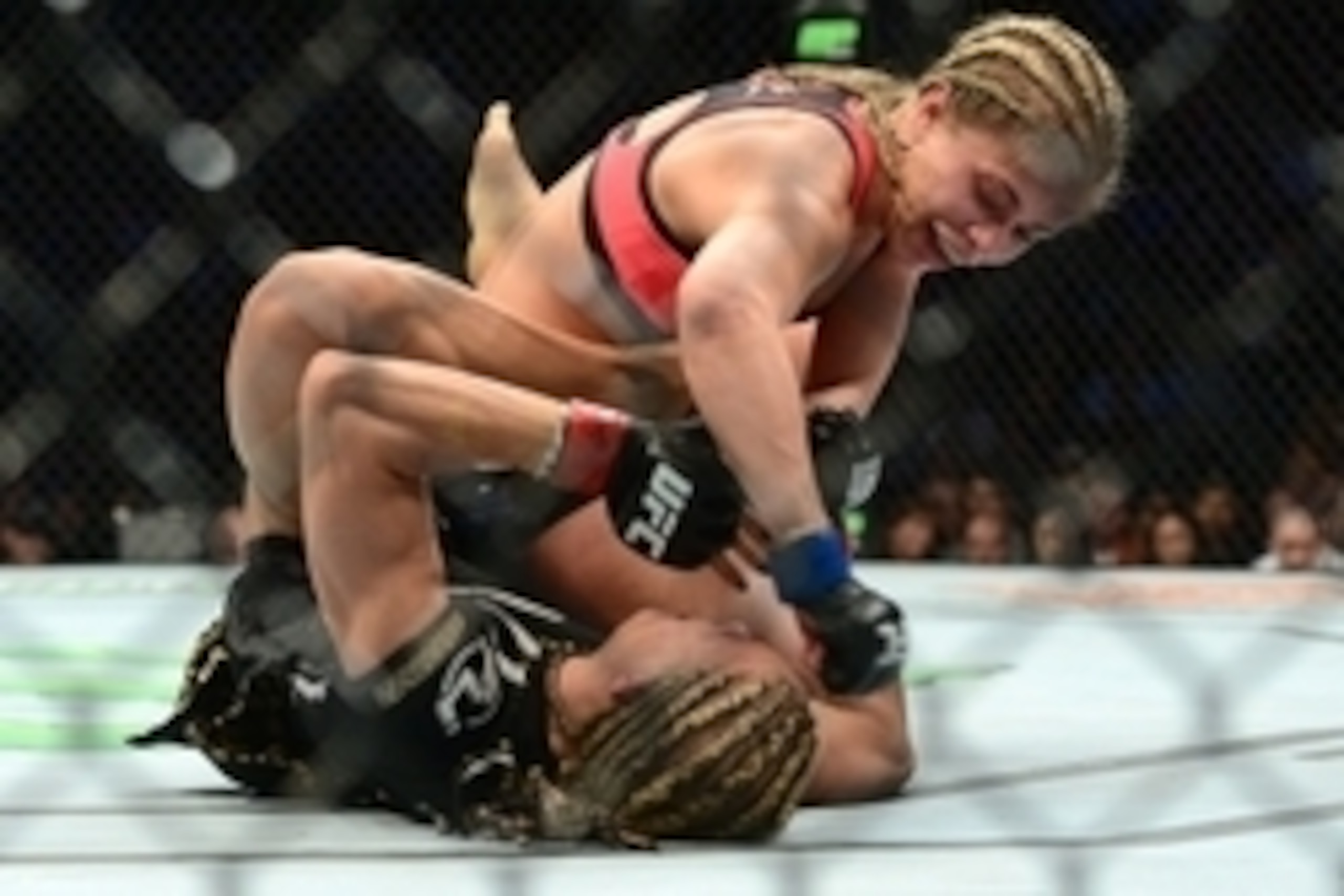Apr 18, 2015; Newark, NJ, USA; Felice Herrig (red) and Paige VanZant (blue) fight during UFC Fight Night at Prudential Center. VanZant won via unanimous decision. Mandatory Credit: Joe Camporeale-USA TODAY Sports