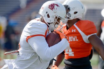 Jan 20, 2015; Mobile, AL, USA; North squad wide receiver Vince Mayle of Washington State (15) carries the ball after a pass reception during North squad practice at Ladd-Peebles Stadium. Mandatory Credit: Glenn Andrews-USA TODAY Sports