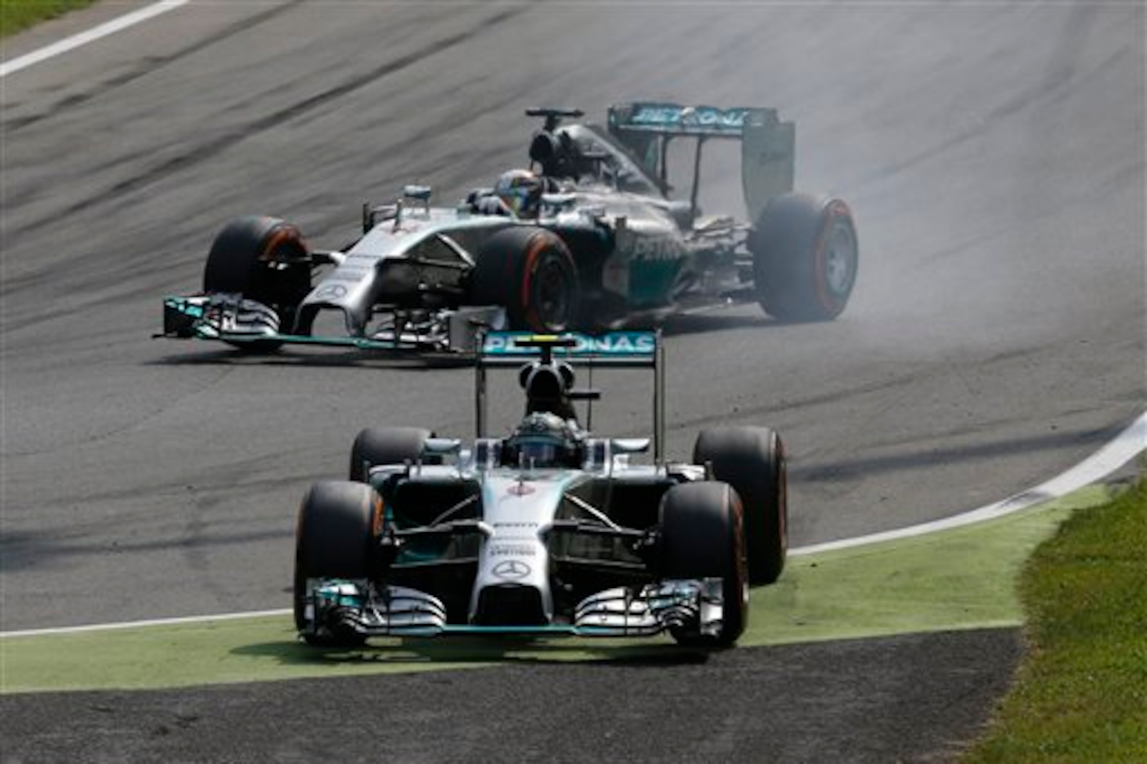 Lewis Hamilton passes Nico Rosberg at Monza 2014.