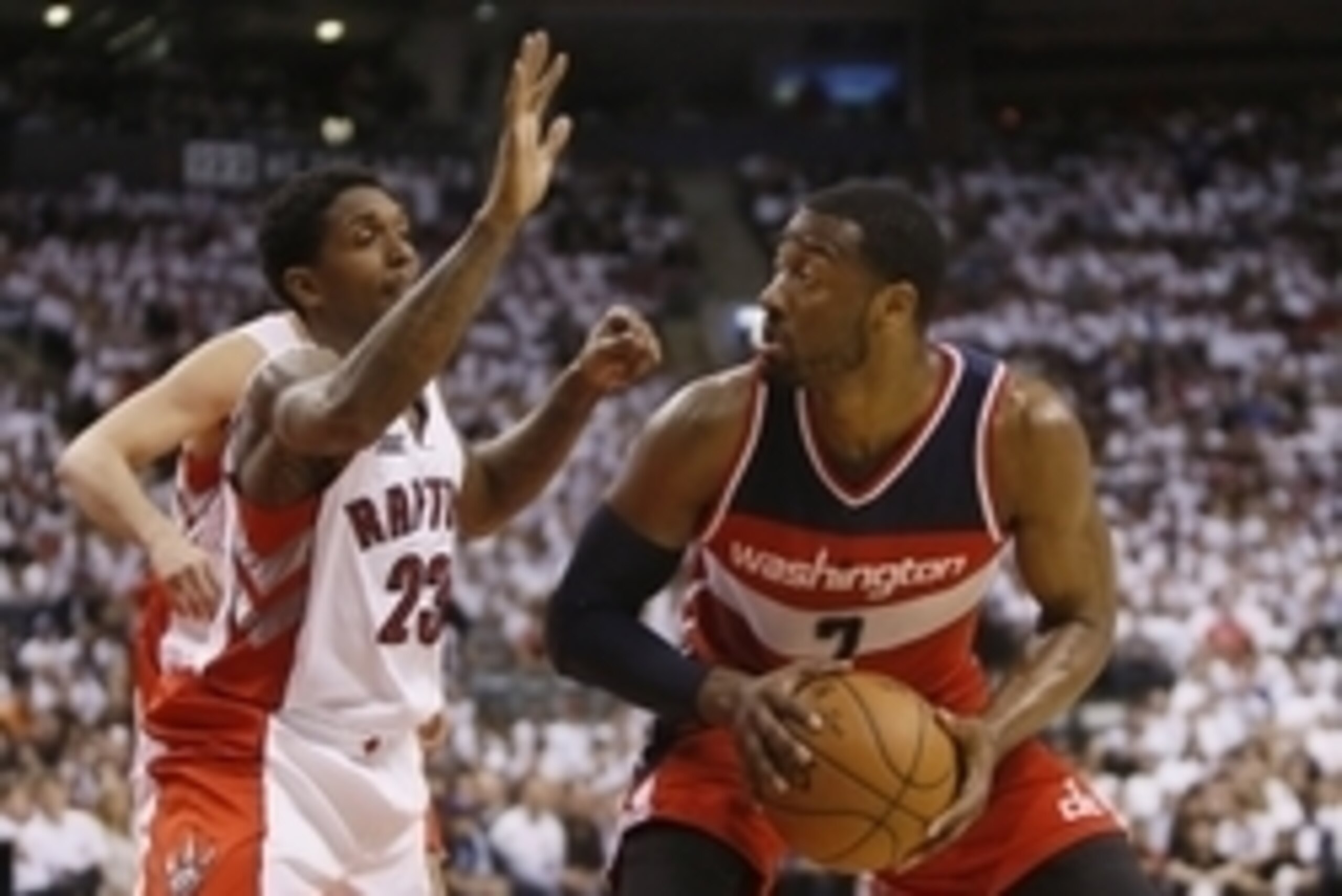 Apr 18, 2015; Toronto, Ontario, CAN; Toronto Raptors guard Louis Williams (23) defends against Washington Wizards guard John Wall (2) in game one of the first round of the NBA Playoffs at Air Canada Centre. Washington defeated Toronto 93-86. Mandatory Cre