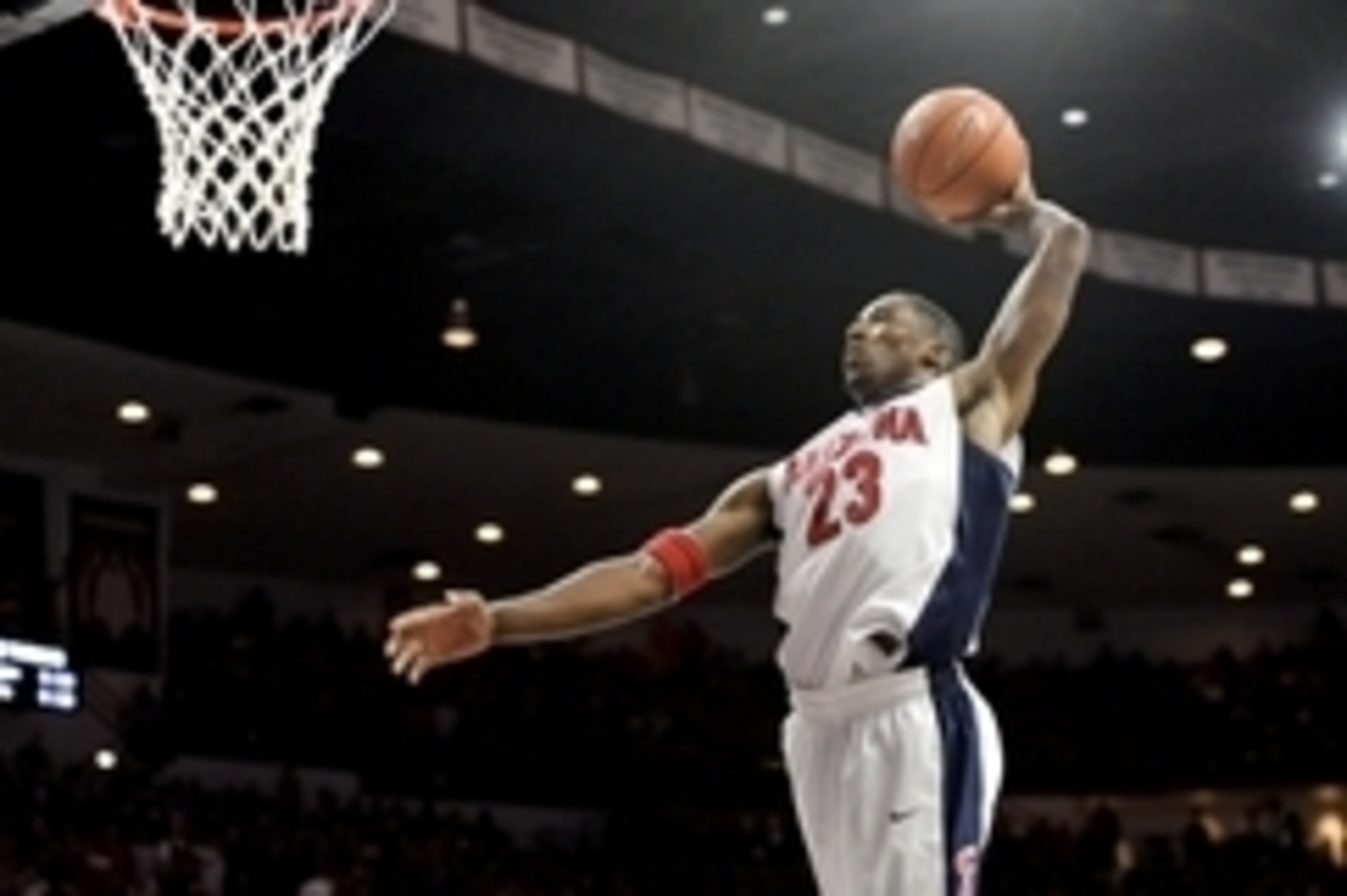 Dec 13, 2014; Tucson, AZ, USA; Arizona Wildcats forward Rondae Hollis-Jefferson (23) dunks the ball against the Michigan Wolverines during the second half at McKale Center. Arizona won 80-53. Mandatory Credit: Casey Sapio-USA TODAY Sports