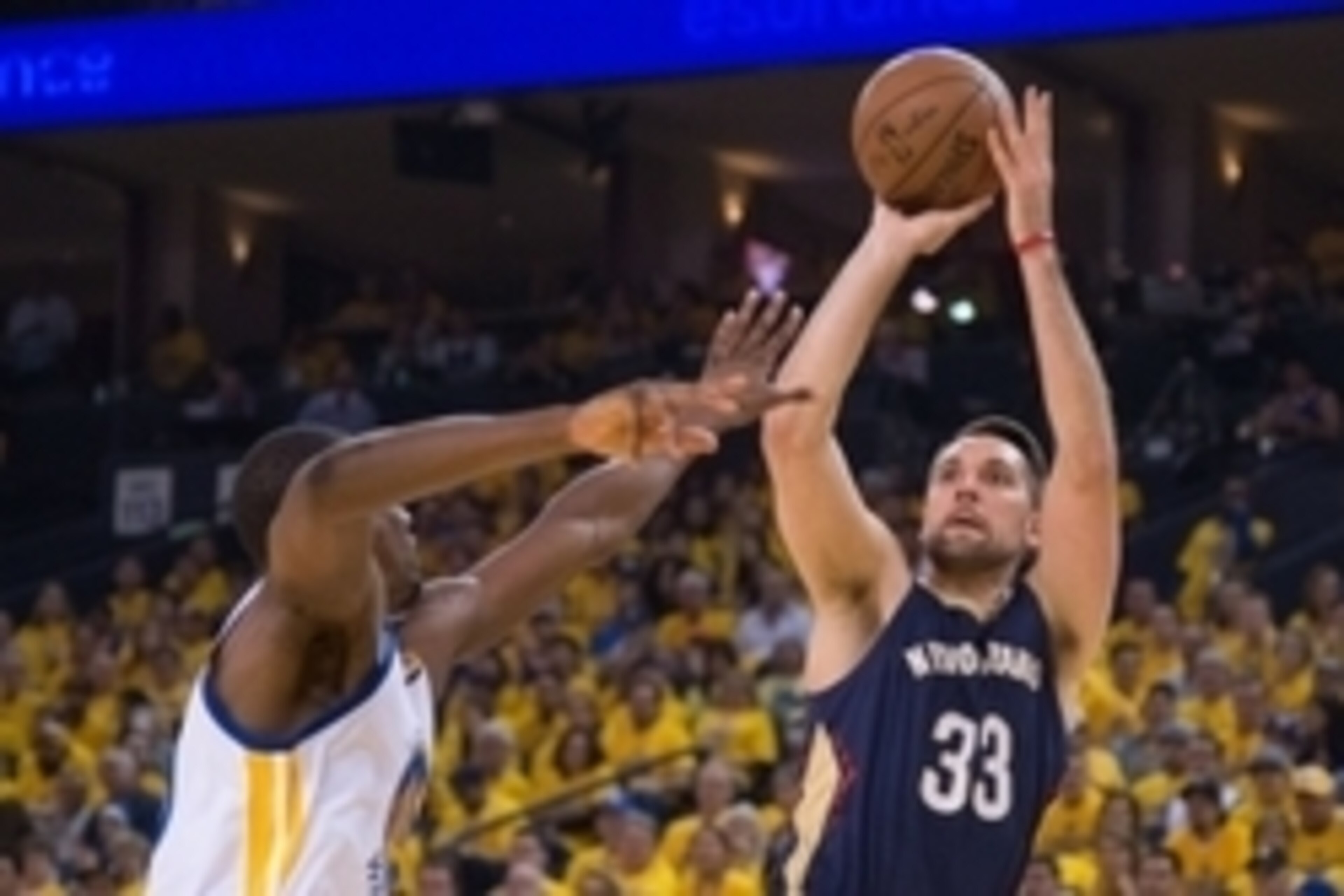April 18, 2015; Oakland, CA, USA; New Orleans Pelicans forward Ryan Anderson (33) shoots the basketball against Golden State Warriors forward Harrison Barnes (40) during the second quarter in game one of the second round of the NBA Playoffs at Oracle Aren