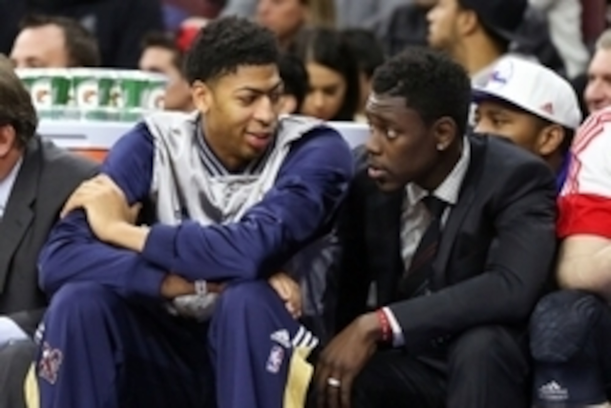 Jan 16, 2015; Philadelphia, PA, USA; New Orleans Pelicans forward Anthony Davis (23) and guard Jrue Holiday (11) sit on the bench during the game against the Philadelphia 76ers at Wells Fargo Center. Mandatory Credit: Bill Streicher-USA TODAY Sports