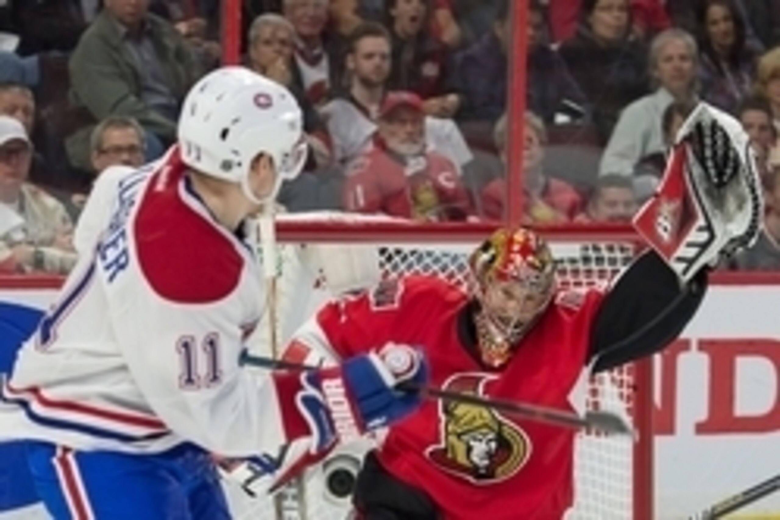 Apr 22, 2015; Ottawa, Ontario, CAN; Montreal Canadiens right wing Brendan Gallagher (11) follows the puck as it goes above Ottawa Senators goalie Craig Anderson (41) in game four of the first round of the 2015 Stanley Cup Playoffs at Canadian Tire Centre. Apr 22, 2015; Ottawa, Ontario, CAN; Montreal Canadiens right wing Brendan Gallagher (11) follows the puck as it goes above Ottawa Senators goalie Craig Anderson (41) in game four of the first round of the 2015 Stanley Cup Playoffs at Canadian Tire Centre.