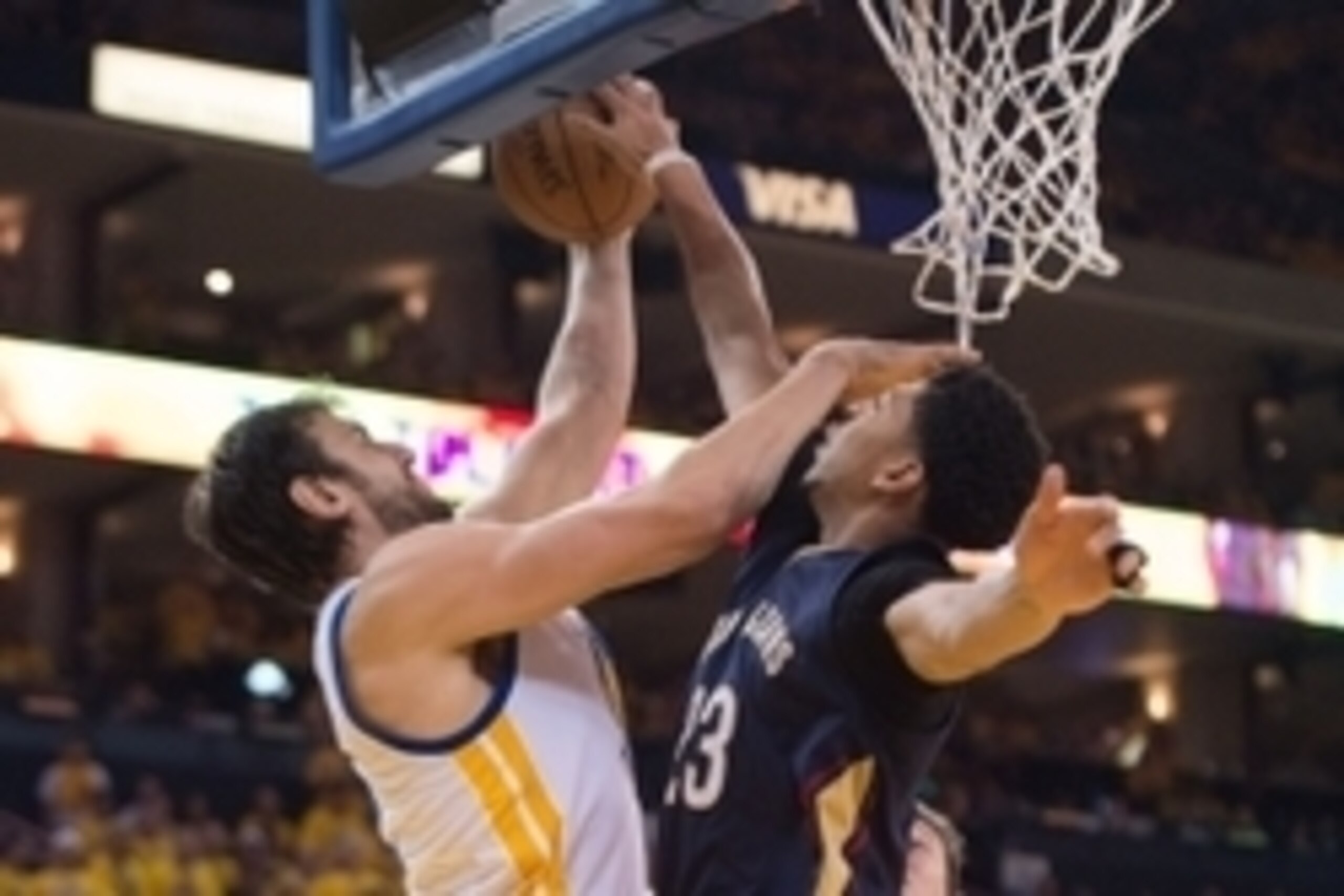 April 20, 2015; Oakland, CA, USA; New Orleans Pelicans forward Anthony Davis (23, right) blocks the shot of Golden State Warriors center Andrew Bogut (12, left) during the third quarter in game two of the first round of the NBA Playoffs at Oracle Arena. T