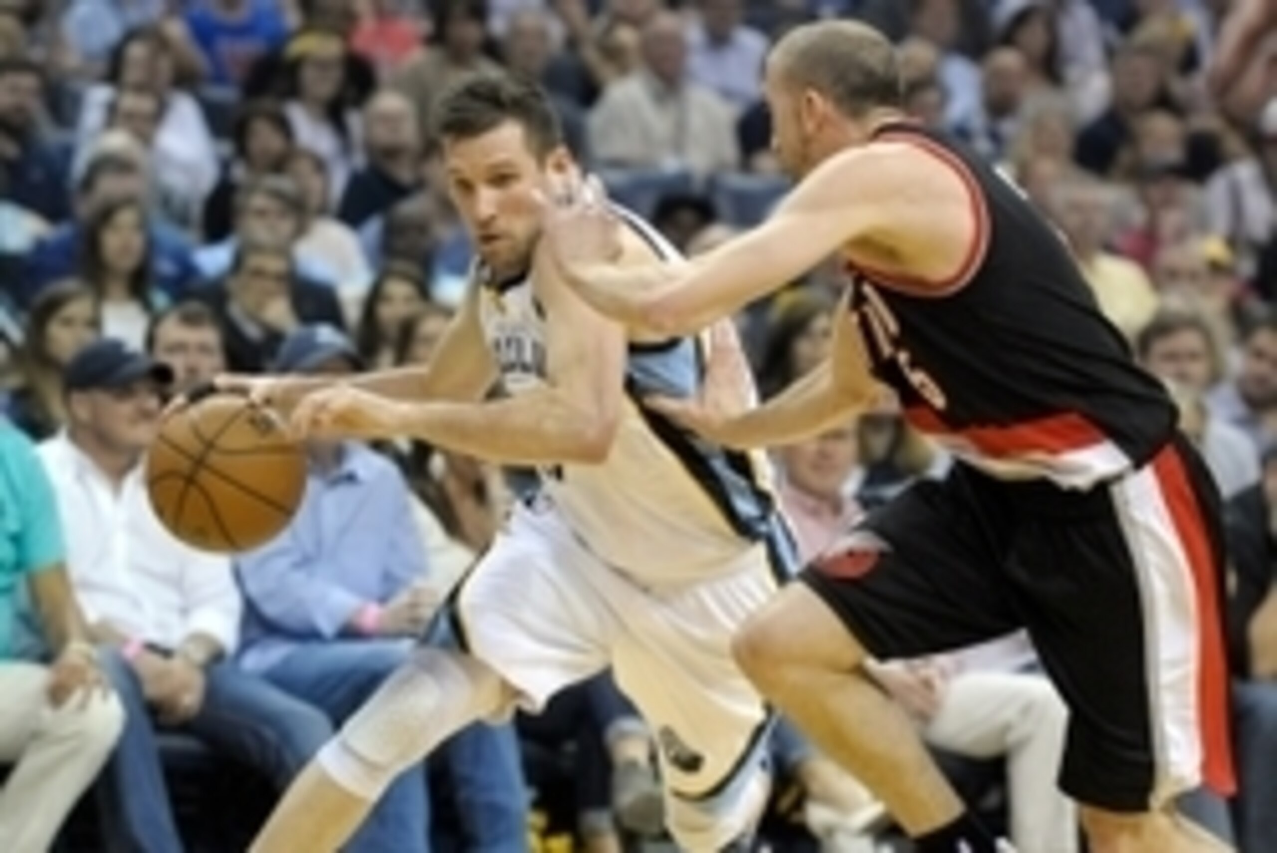 Apr 22, 2015; Memphis, TN, USA; Memphis Grizzlies guard Beno Udrih (19) drives to the basket against Portland Trail Blazers guard Steve Blake (5) during game two of the first round of the NBA Playoffs at FedExForum. Mandatory Credit: Justin Ford-USA TODAY