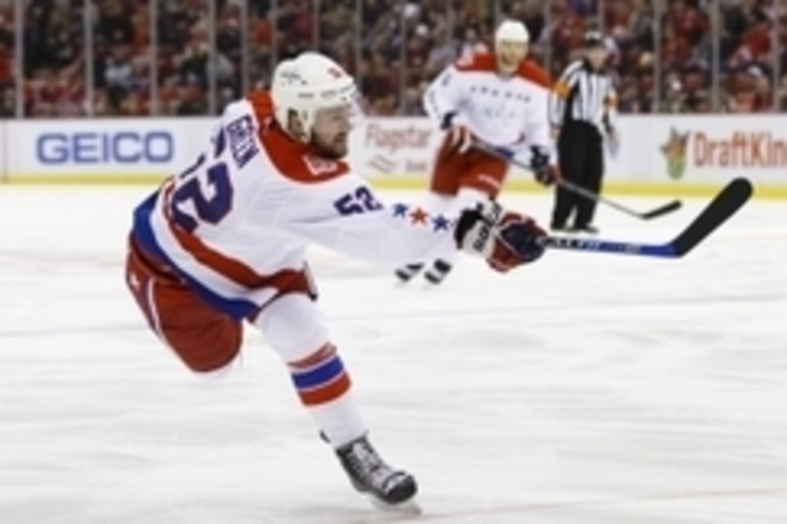 Apr 5, 2015; Detroit, MI, USA; Washington Capitals defenseman Mike Green (52) scores a goal in the second period against the Detroit Red Wings at Joe Louis Arena. Mandatory Credit: Rick Osentoski-USA TODAY Sports